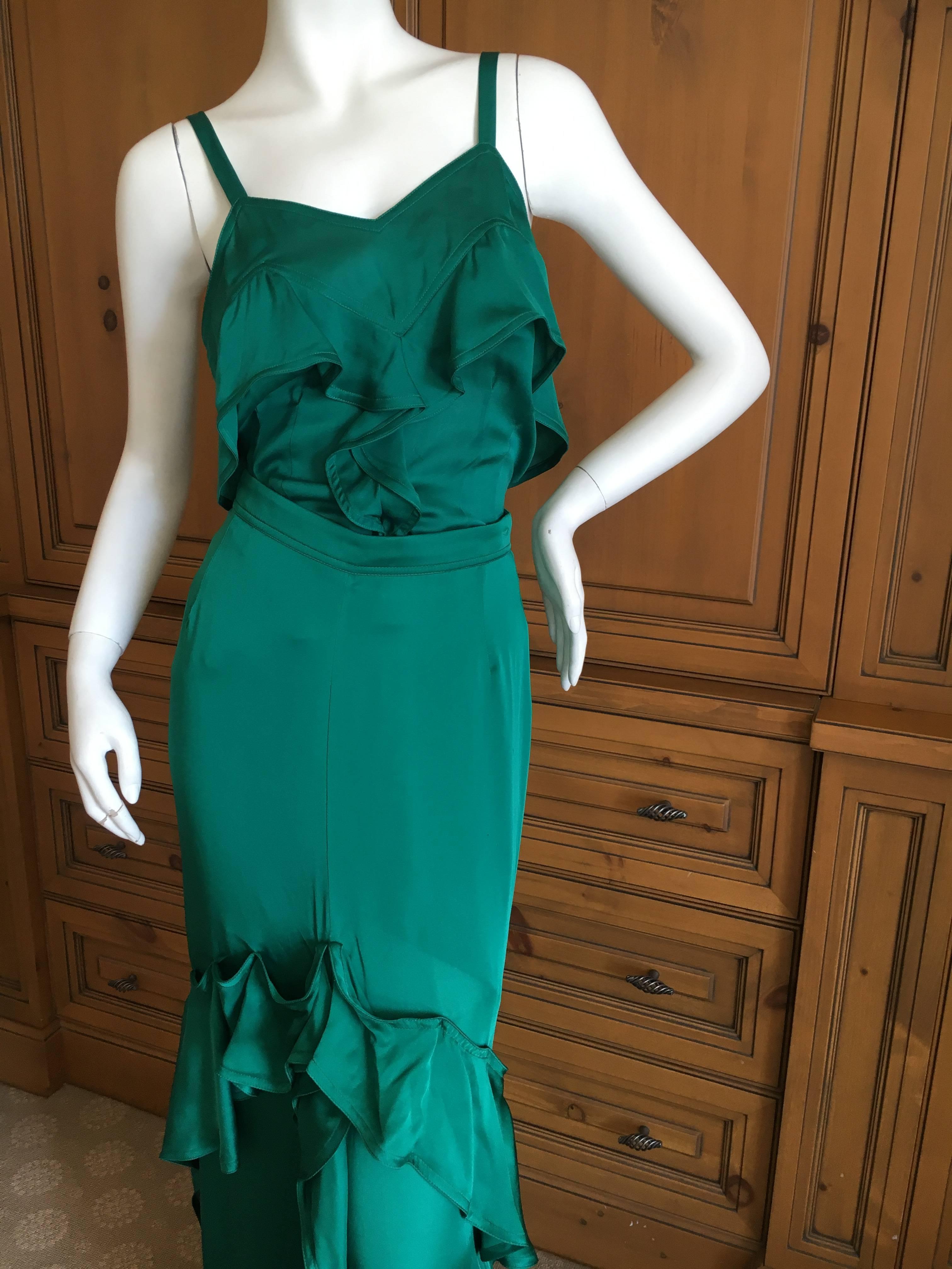 Yves Saint Laurent by Tom Ford Two Piece Ruffled Dress.
2003 green silk dress in two pieces from Tom Ford for YSL.
This is new with tags, originally $3390.
Size 8
Top;
Bust 38"
Waist 31"
Length 25"
Skirt
Waist 30"
Hips