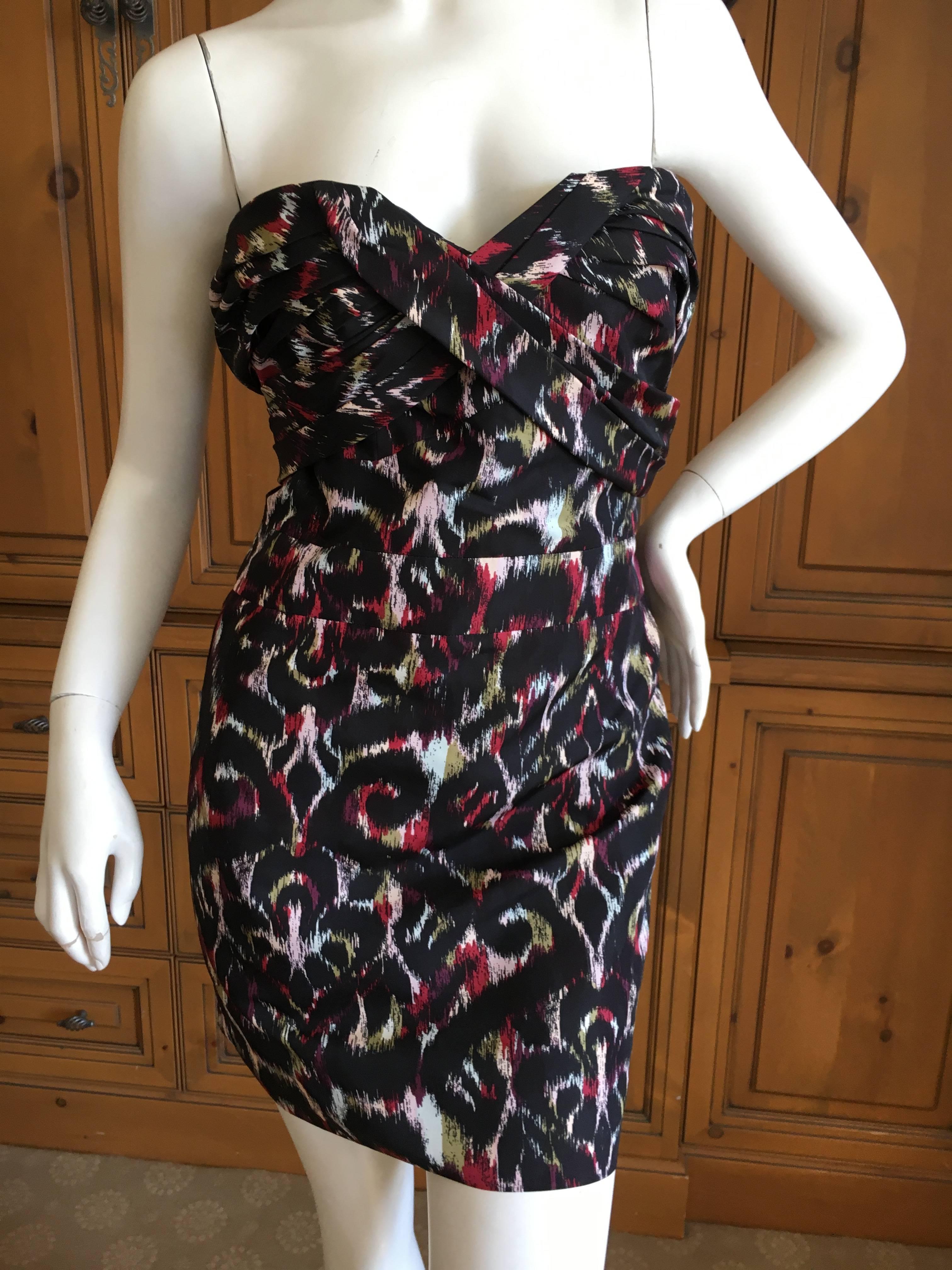 Christian Dior by John Galliano Tribal Print Strapless Mini Dress w Inner Corset.
Size Small.
Details to follow