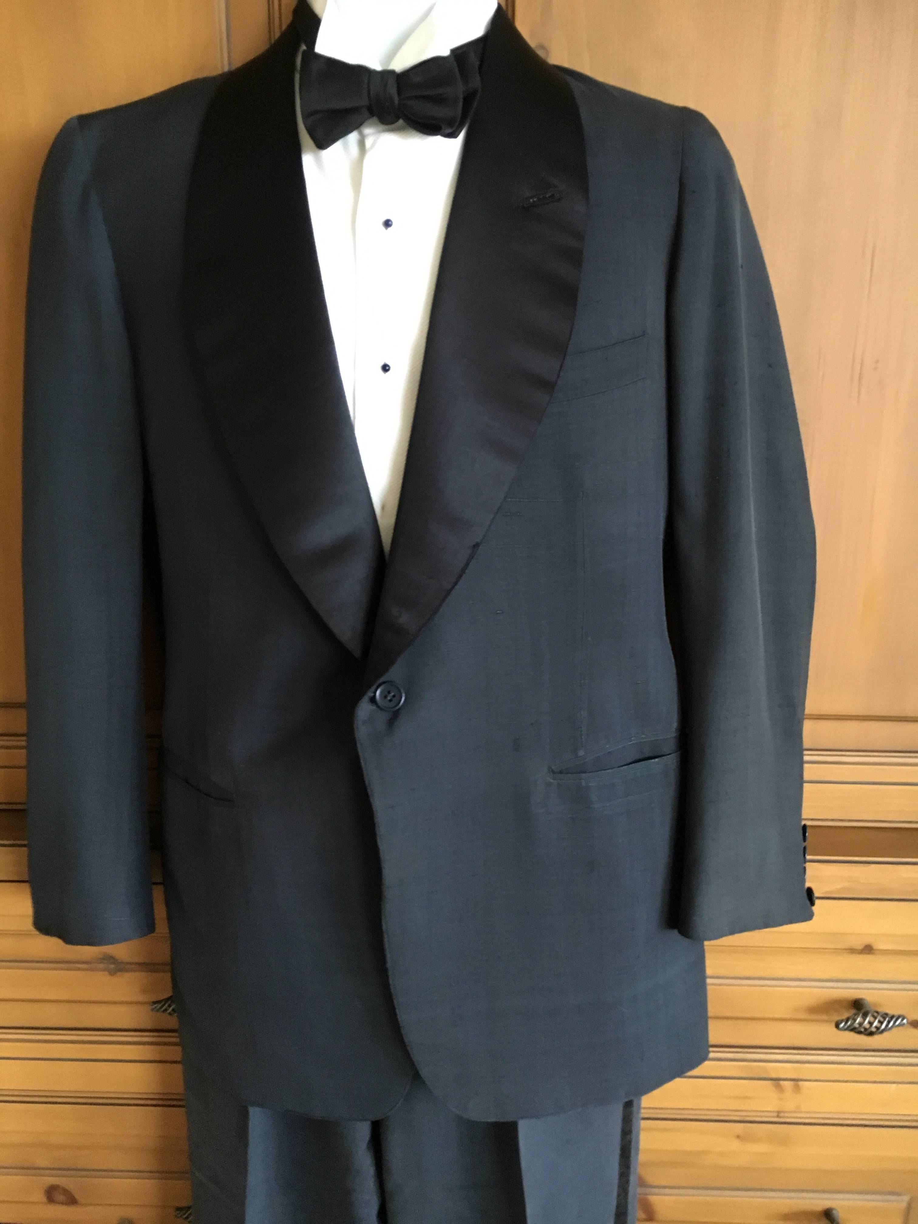 1953 Navy Blue Dupioni Silk Shawl Collar Tuxedo from  Society Tailor E.F. Dunne and Company New York .
 
The owner was a polo playing count, whose estate we are just beginning to process. 
 The estate was run in the old style and these suits were