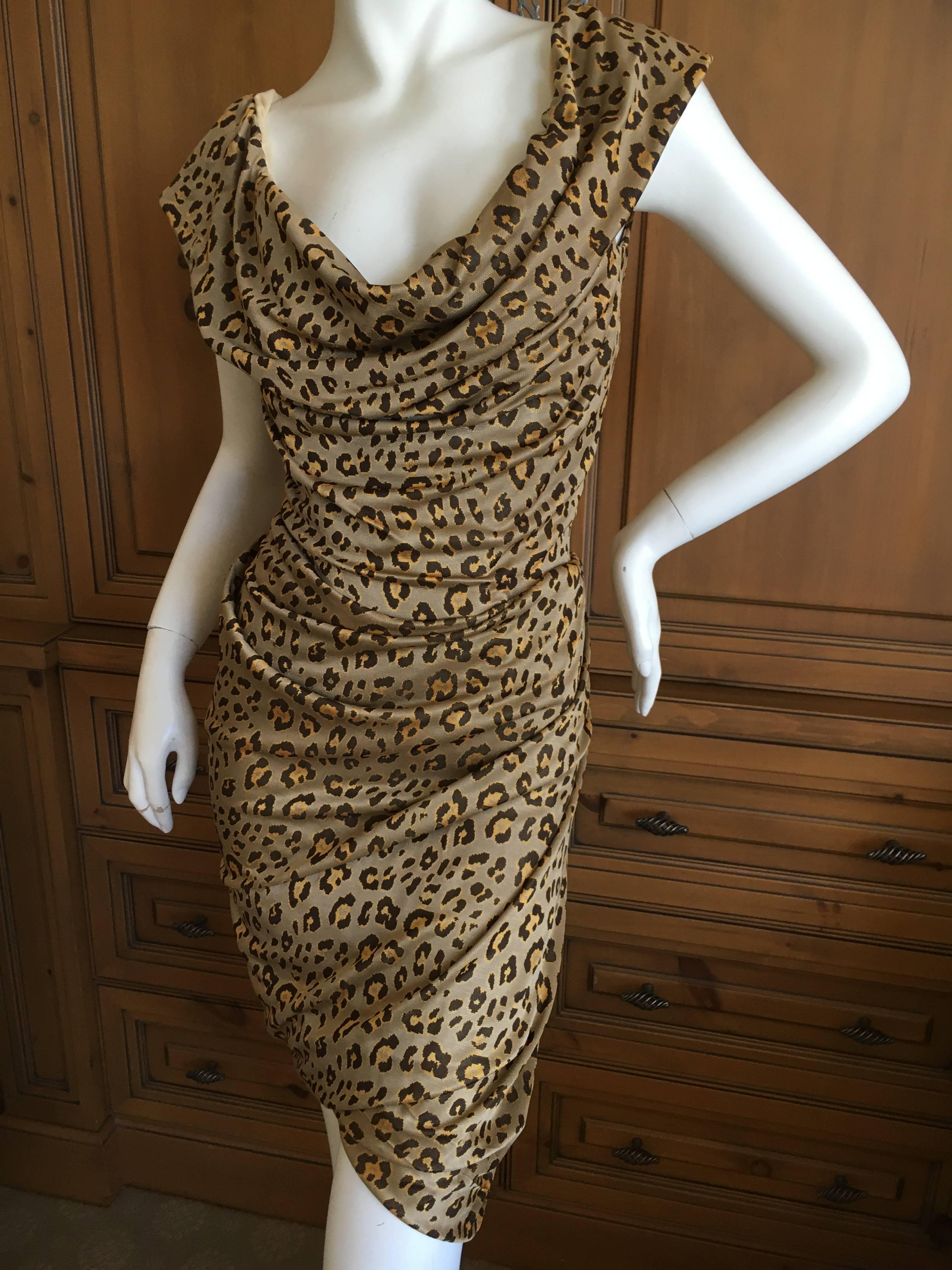 Super sexy draped leopard print dress from Vivienne Westwood Red Label.
There is a full inner corset, see photo's .
There is a lot of stretch in this fabric.
Size Small 
Bust 36