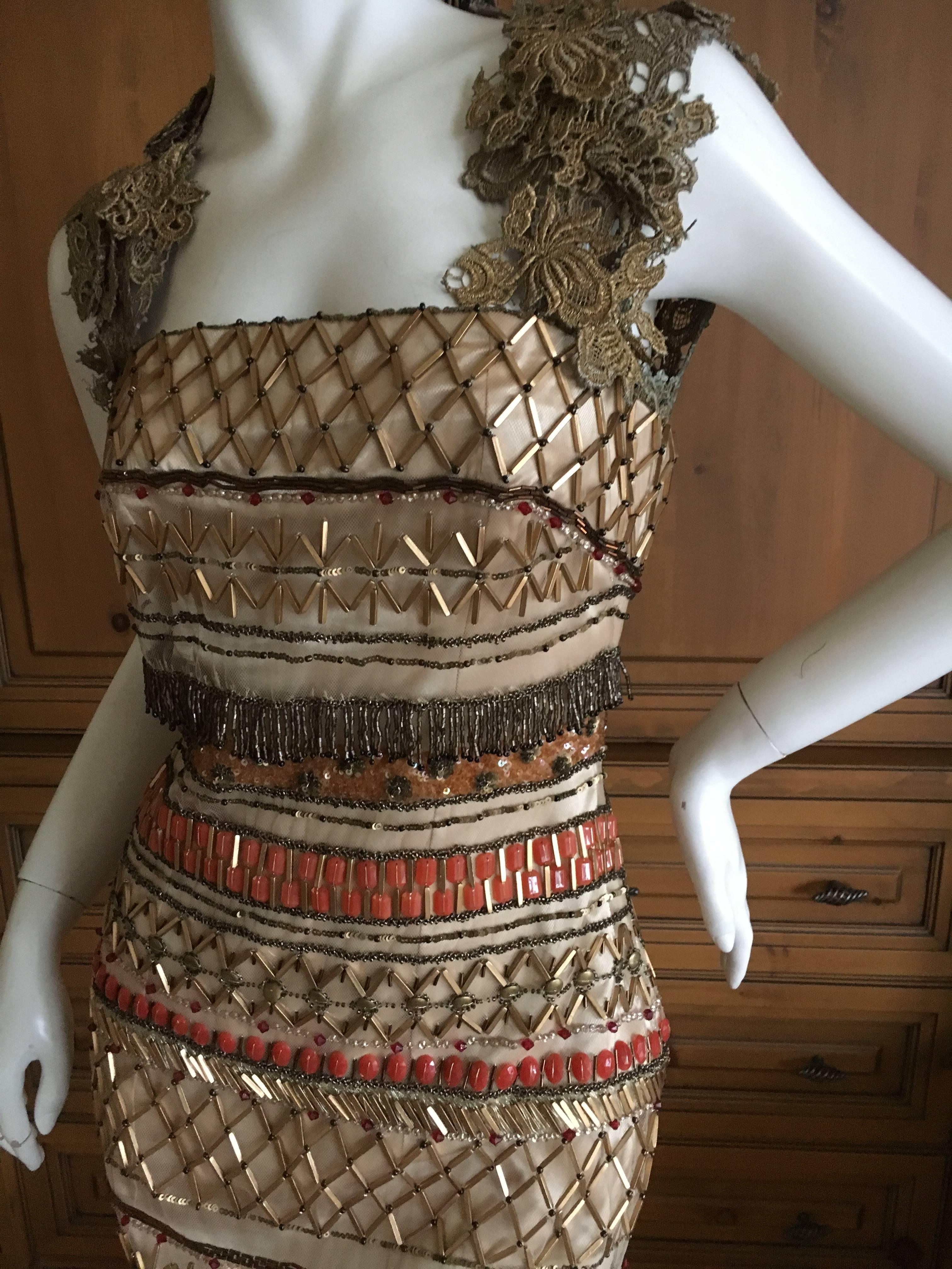 Valentino Vintage Beautifully Embellished Cocktail Dress.
The details on this are incredible , Guipure lace,  gold and coral beads on netting over silk. 
Exquisite.
Size 36
Bust 36