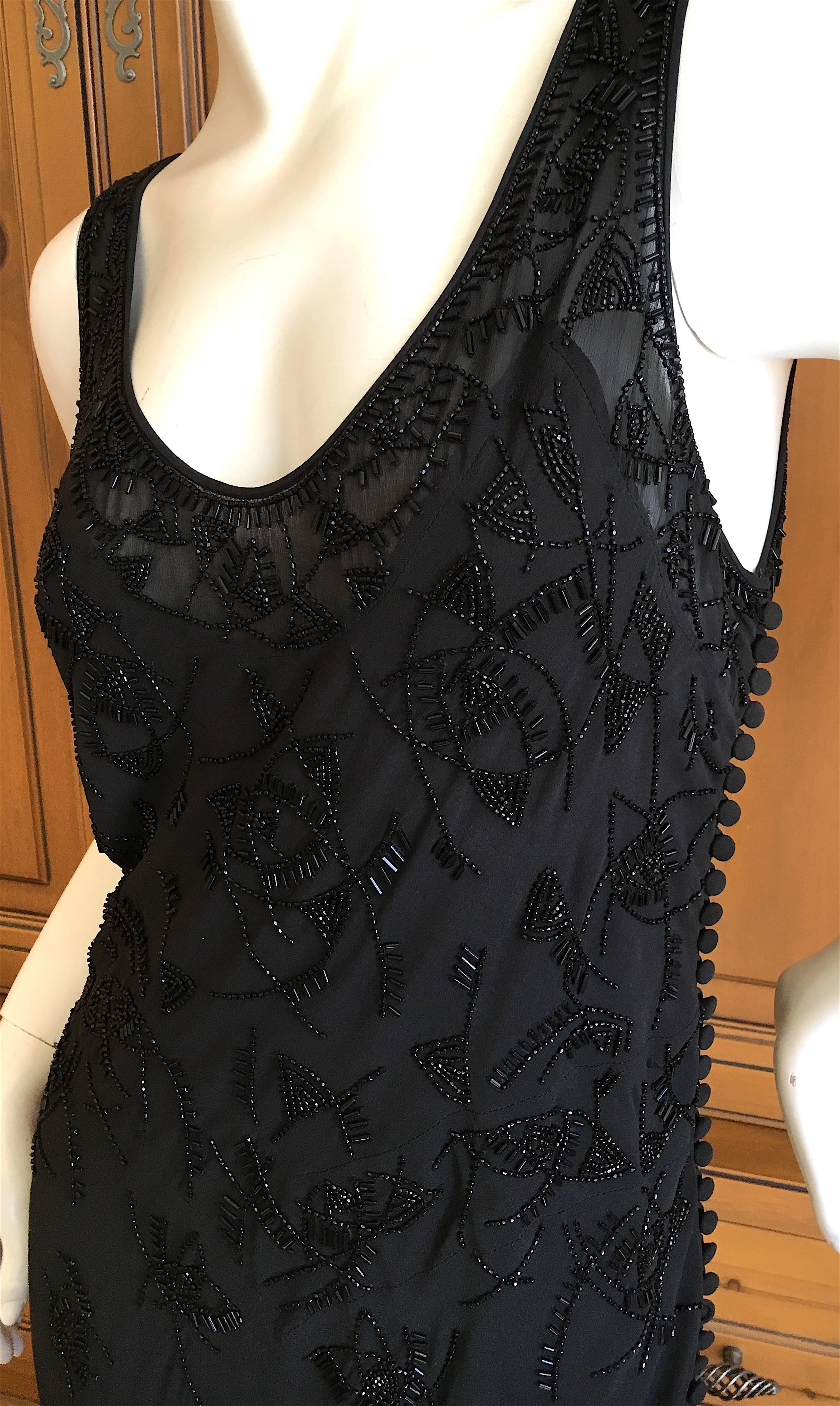 Christian Dior by John Galliano Bead Embellished Black Evening Dress.
This is so much prettier than the photos show, it is hard to photograph.
Subtle black on black, so chic.
Size 42 French Size 10 US
Bust 38"
Waist 32"
Hips