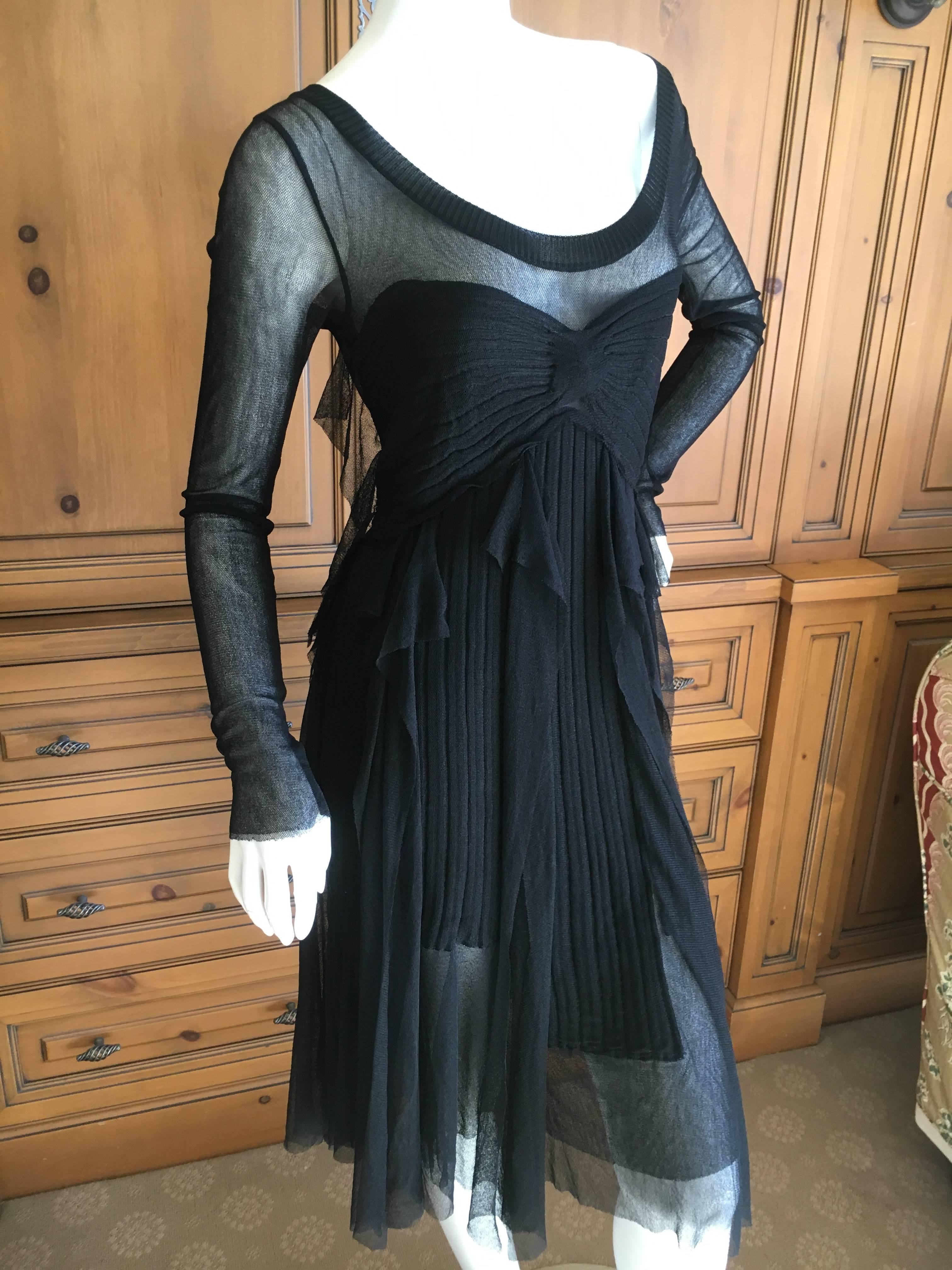 Jean Paul Gaultier Maille by Fuzzi Little Black Dress w Sheer Back.
Size M
Bust 34"
Waist 26"
