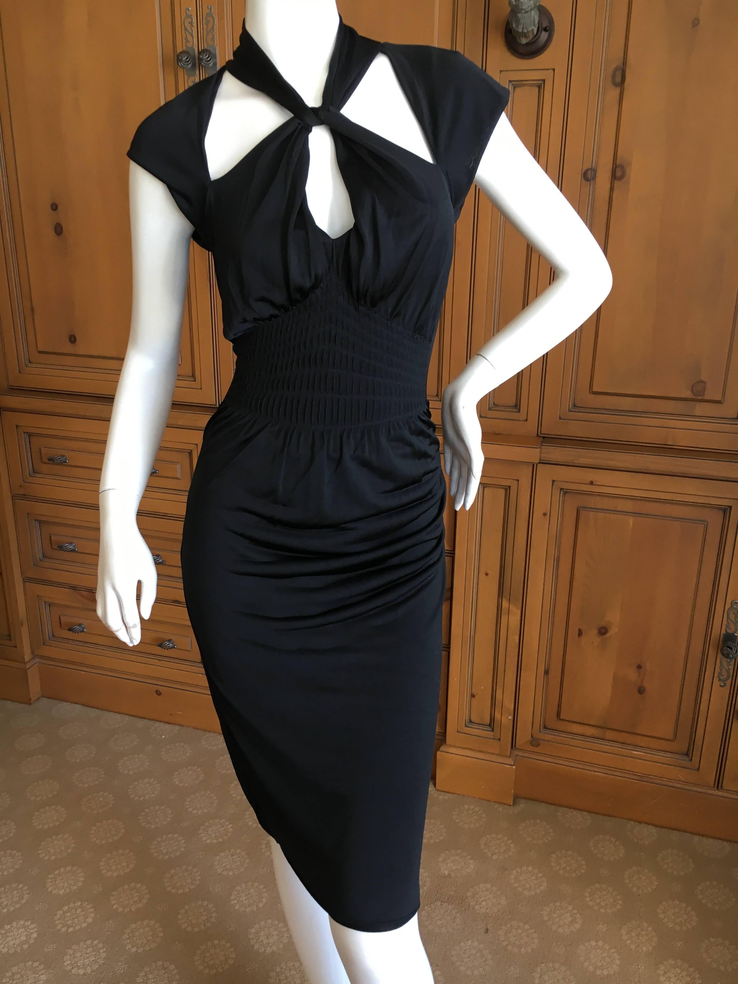 Gucci by Tom Ford Black Backless Knot Dress.
This is classic Tom Ford, sexy coming and going.
Size M.
Bust 38"
Waist 30"
Hips 40"
Length 42"
Excellent condition