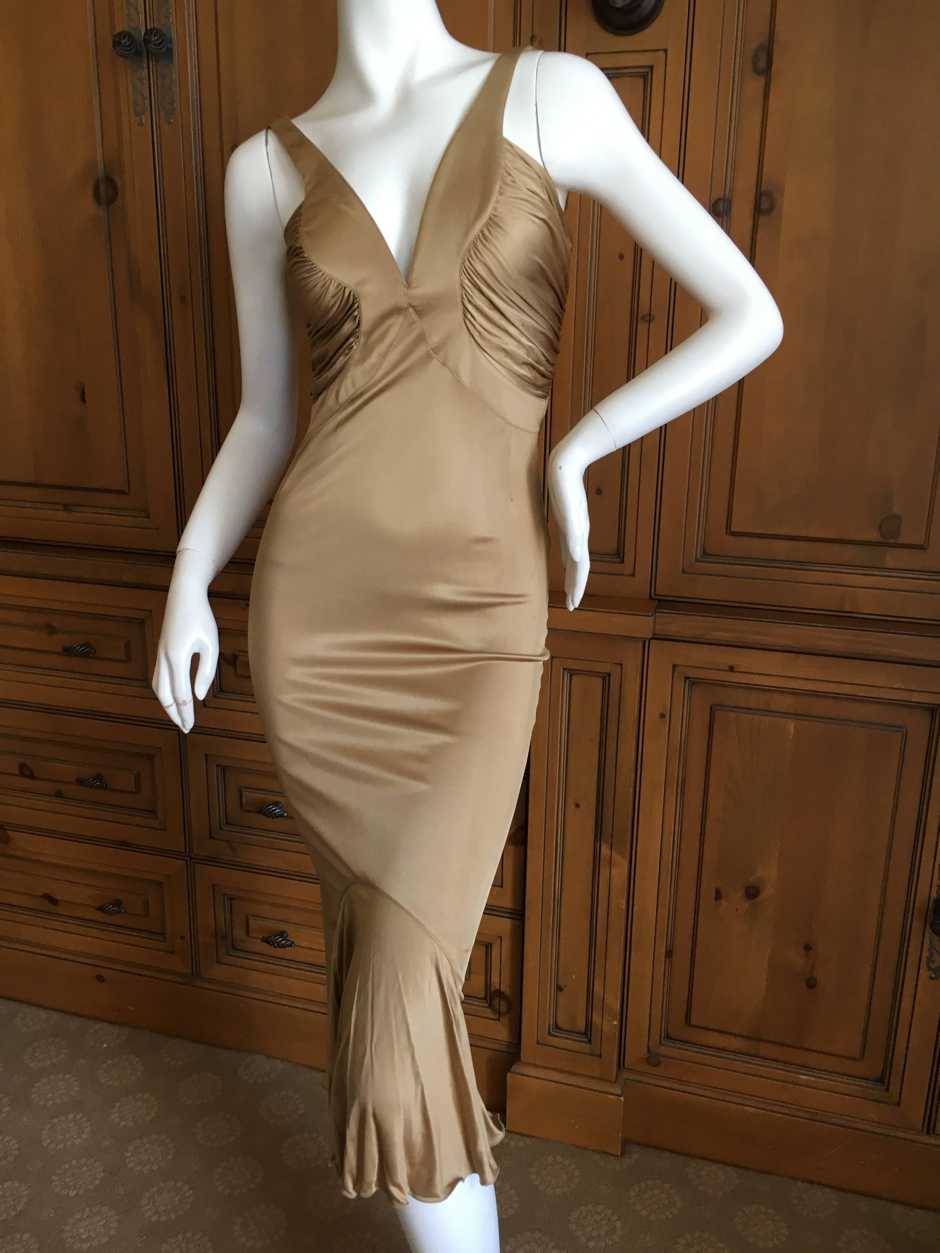 Versace  Gold Jersey Cocktail Dress.
So sexy, like liquid gold, so very body con.
Size 42 US 8
Bust 36
Waist 29