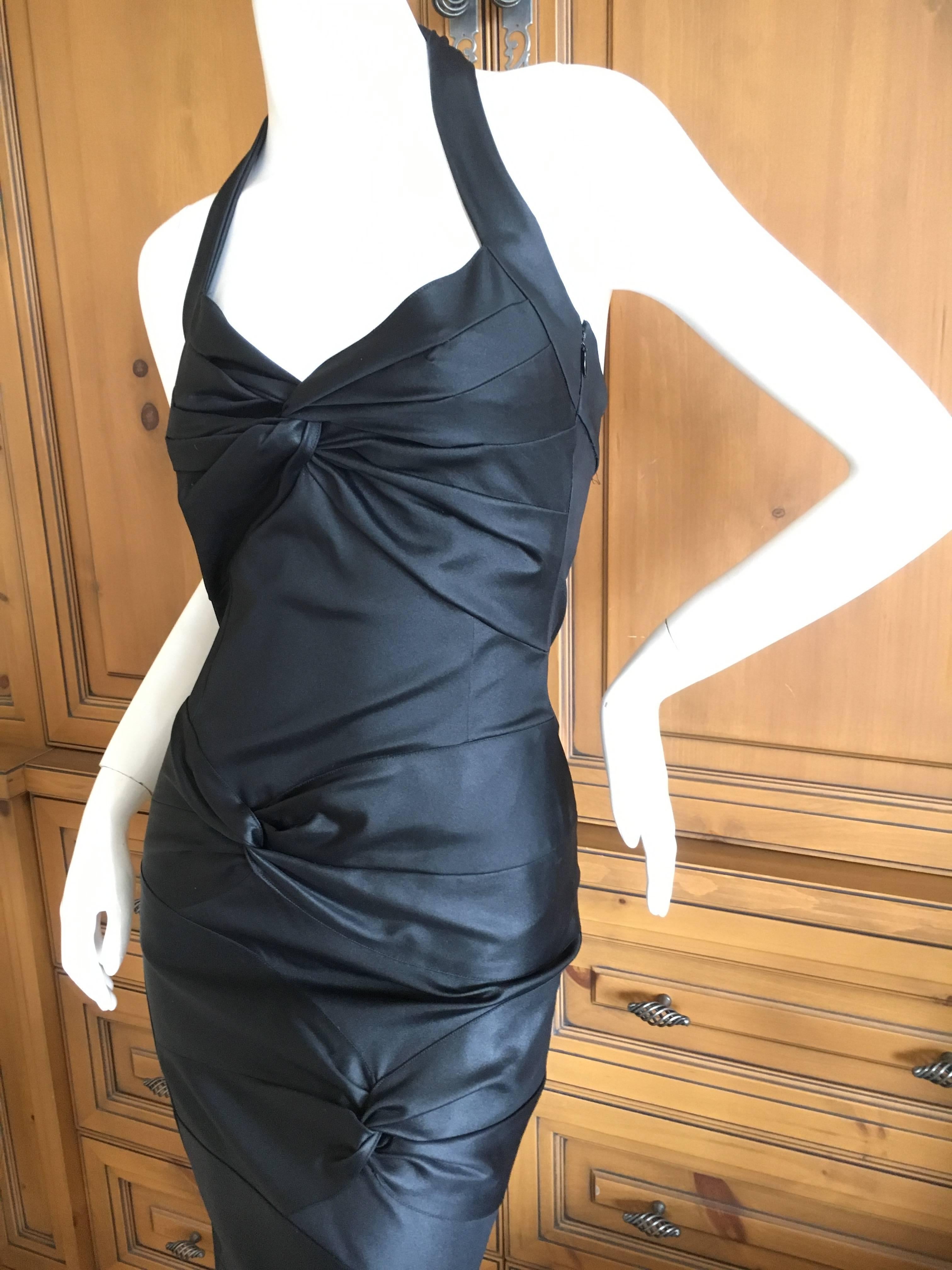 Form flattering bodycon stretch dress by John Galliano for Dior.
I have had this dress in silk in various colors, but this is a very stretchy fabric, not the usual knot dress.
Size 38
Measurements are with out stretching.
Bust 36"
Waist