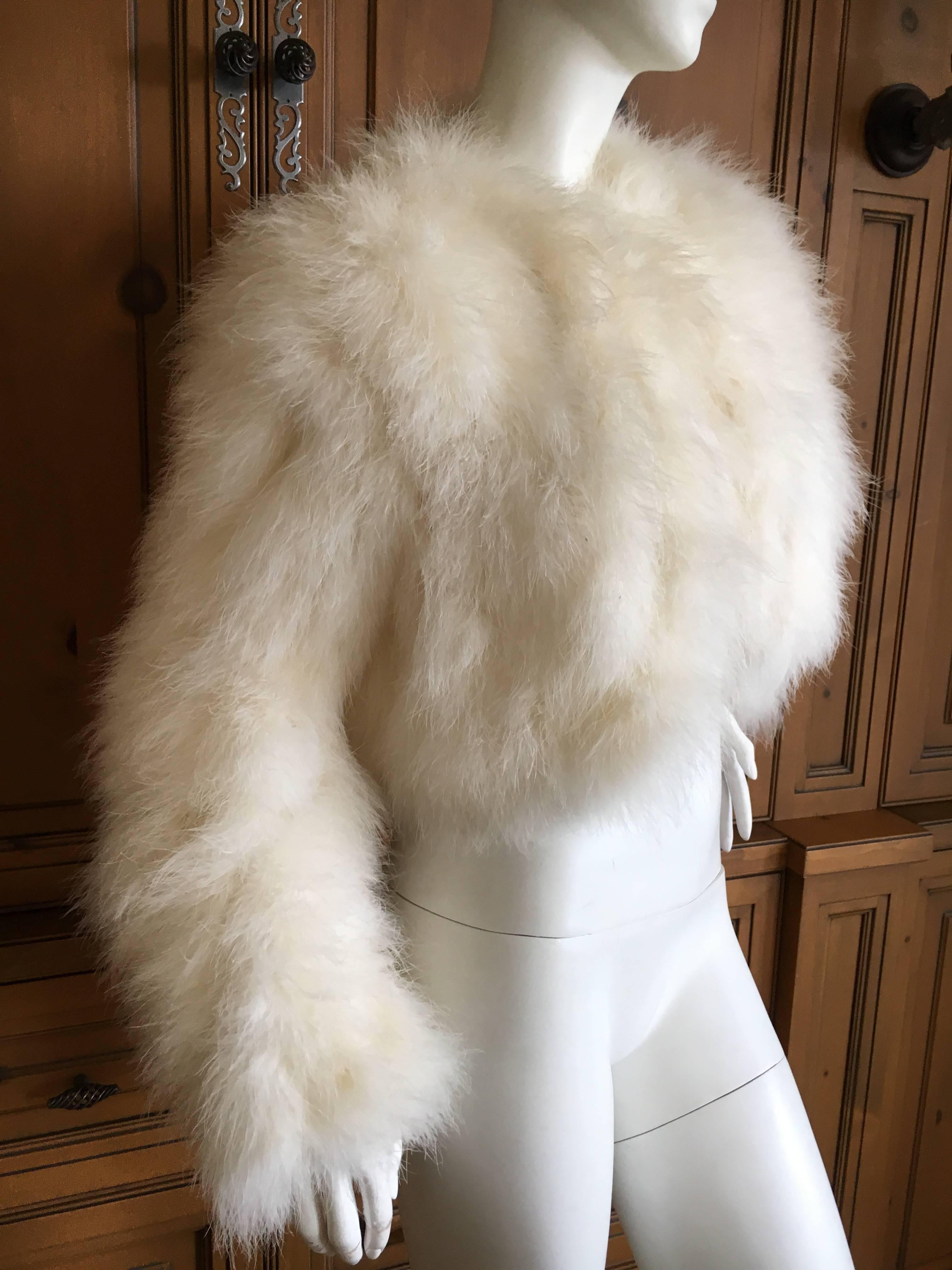 Saks Fifth Avenue 1960 White Maribou Feather Jacket.
Size M
Bust 40
Length 15