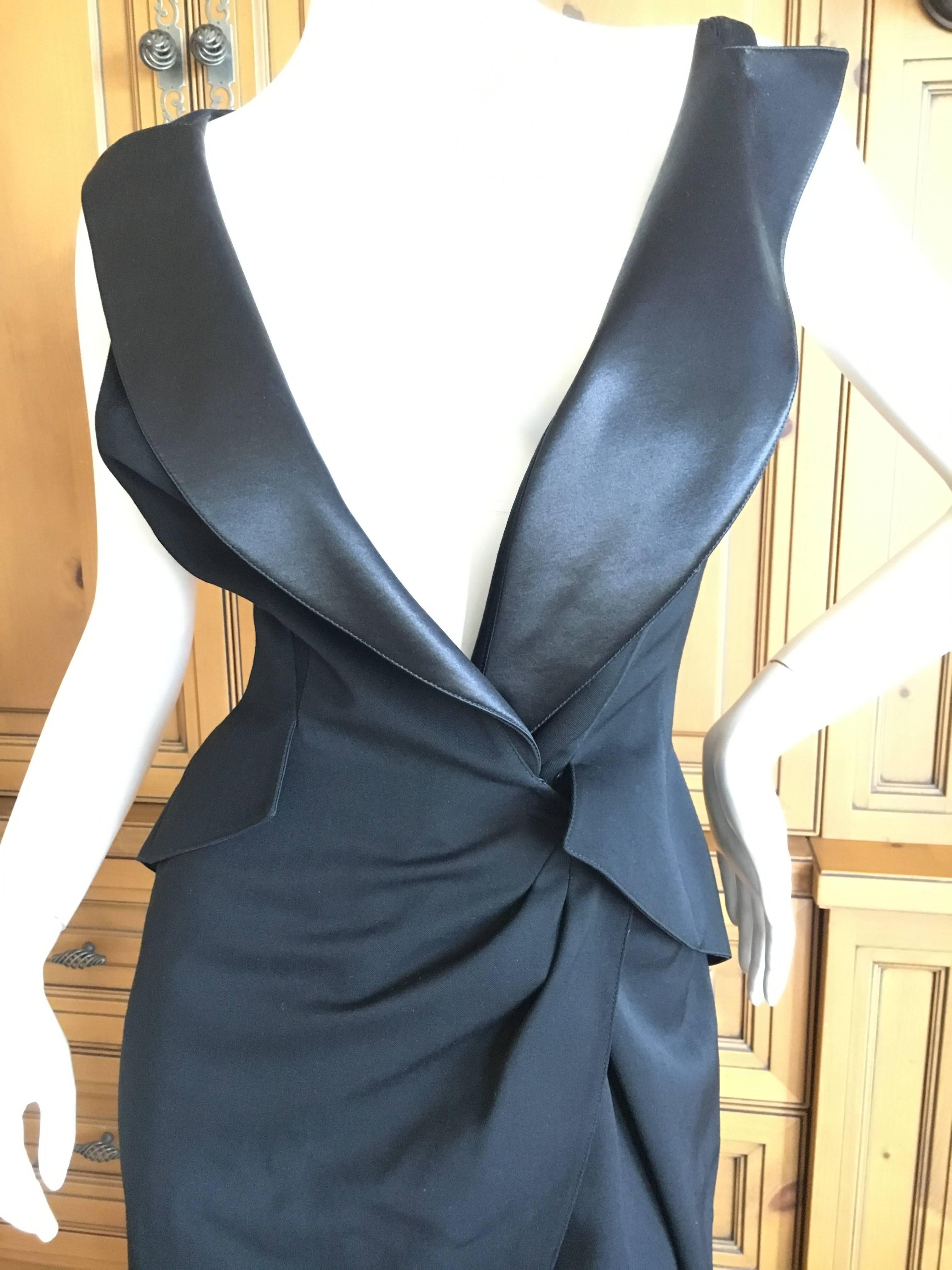 Exquisite tuxedo dress from Thierry Mugler Couture , circa 1988.
This is so sexy, and features a silk bustier that is not attached to the dress.
 I  show the dress without the bustier too , for a sexier silhouette.
It is a wrap style that snaps