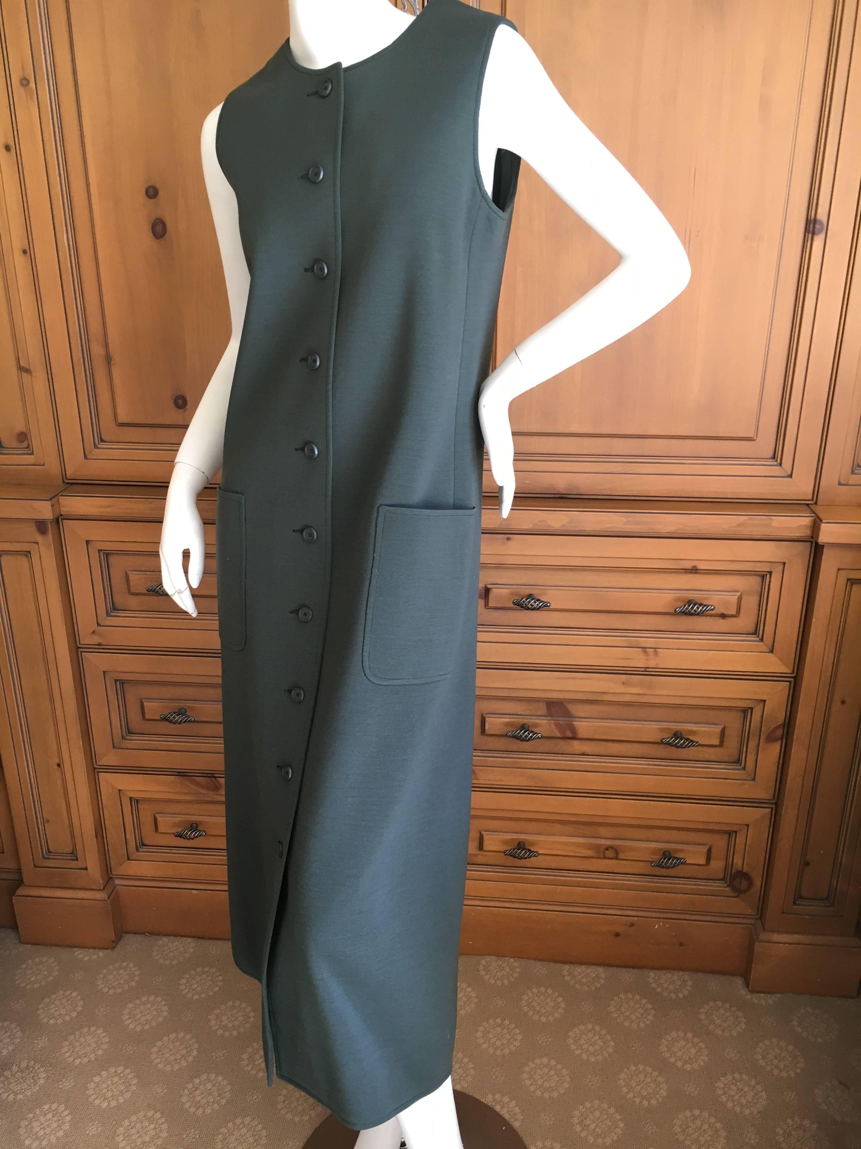 Yves Saint Laurent Early 1960's Olive Green Sleeveless Shift Dress.
Wool , lined in silk.
Size 40
Bust 36