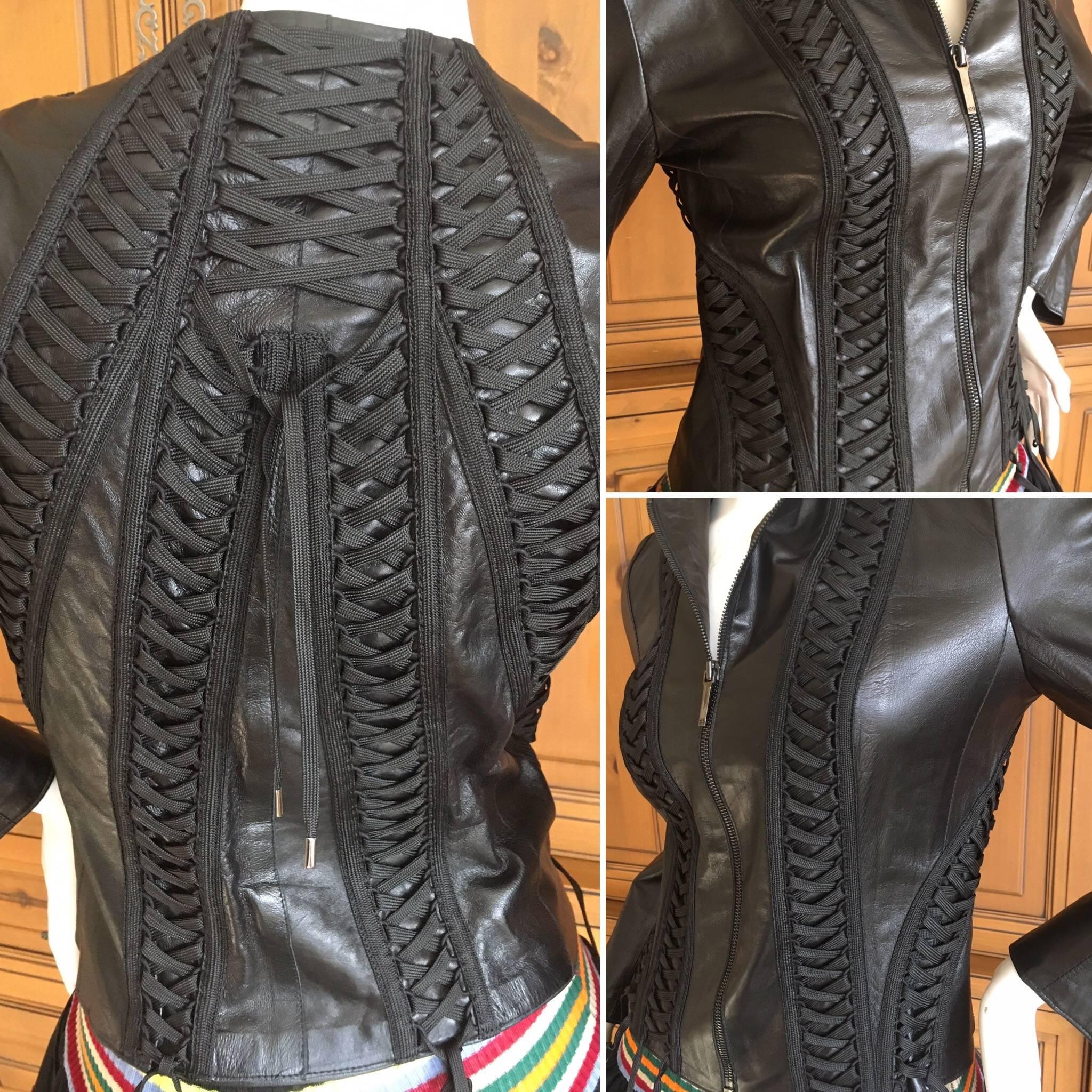 Christian Dior Black Lambskin Leather Corset Laced Bondage Jacket by John Galliano.
Size 36
Bust 36"
Waist 28"
Length 20"
Sleeve 26"
Excellent condition