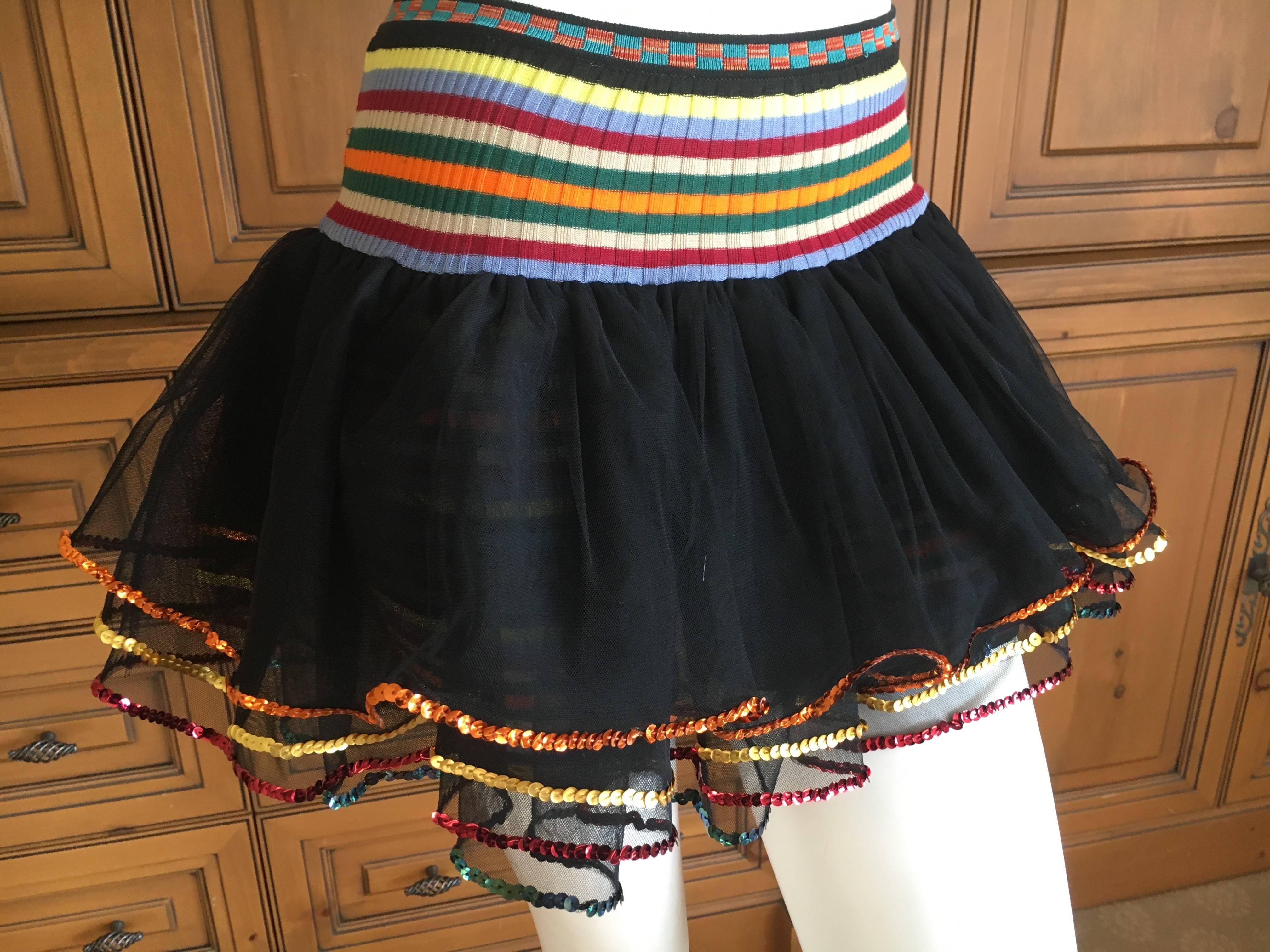 Jean Paul Gaultier 90's Club Kid Rainbow 2 Piece w Mini Can Can Skirt.
This is so sweet, featuring shorts with attached super short tulle can can skirts edged in sequins, and a matching copped top.
This is a ribbed stretch knit with a lot of