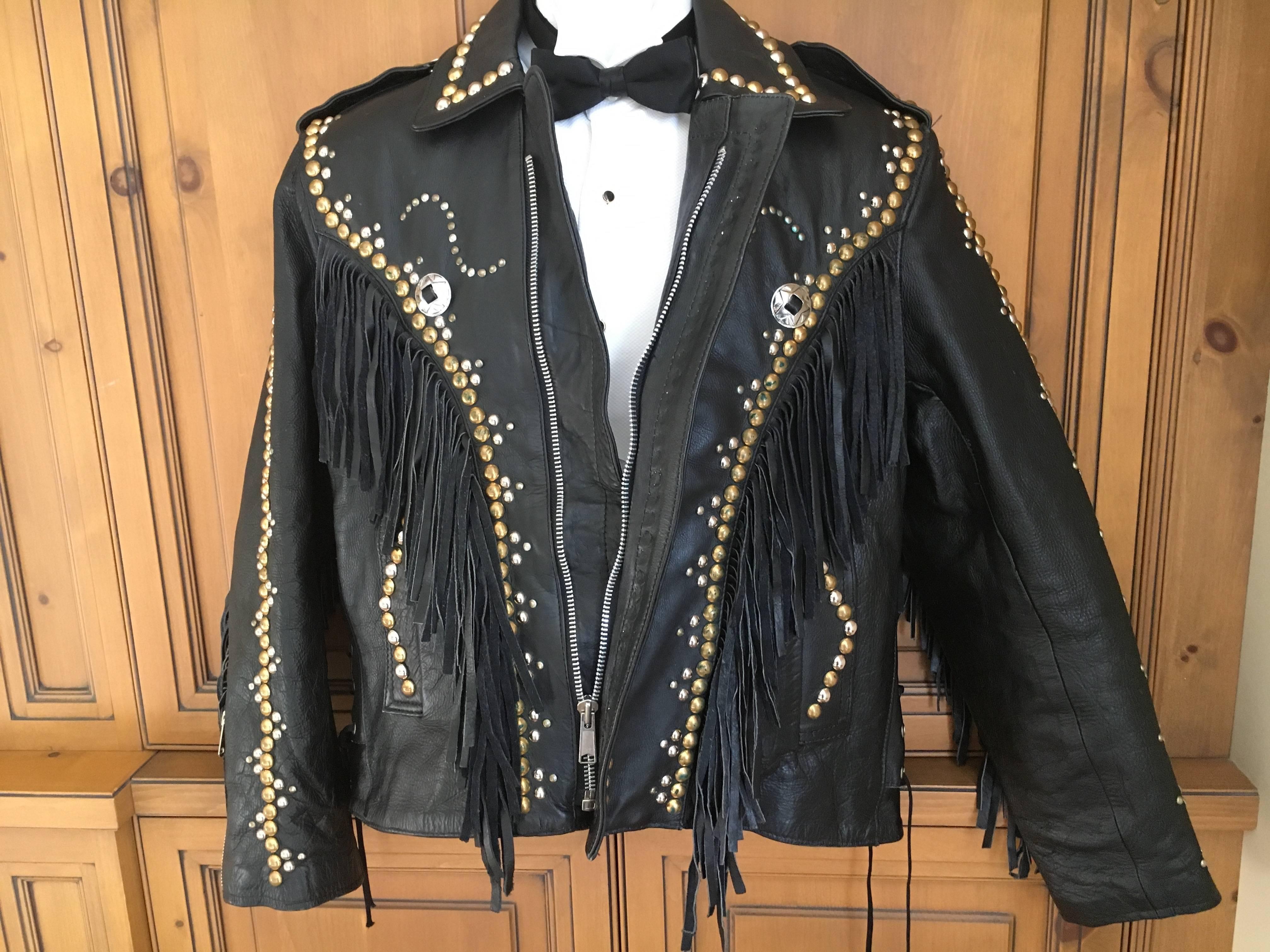 Amazing Vintage Men's Leather Motorcycle Jacket with Fringe and Studs.

Trimmed in Western style, this is from an old Rodeo family in Wyoming.

Size 42-44

  Appx Measurements 

Chest 46" Sleeve 25" Length 26" Across shoulders