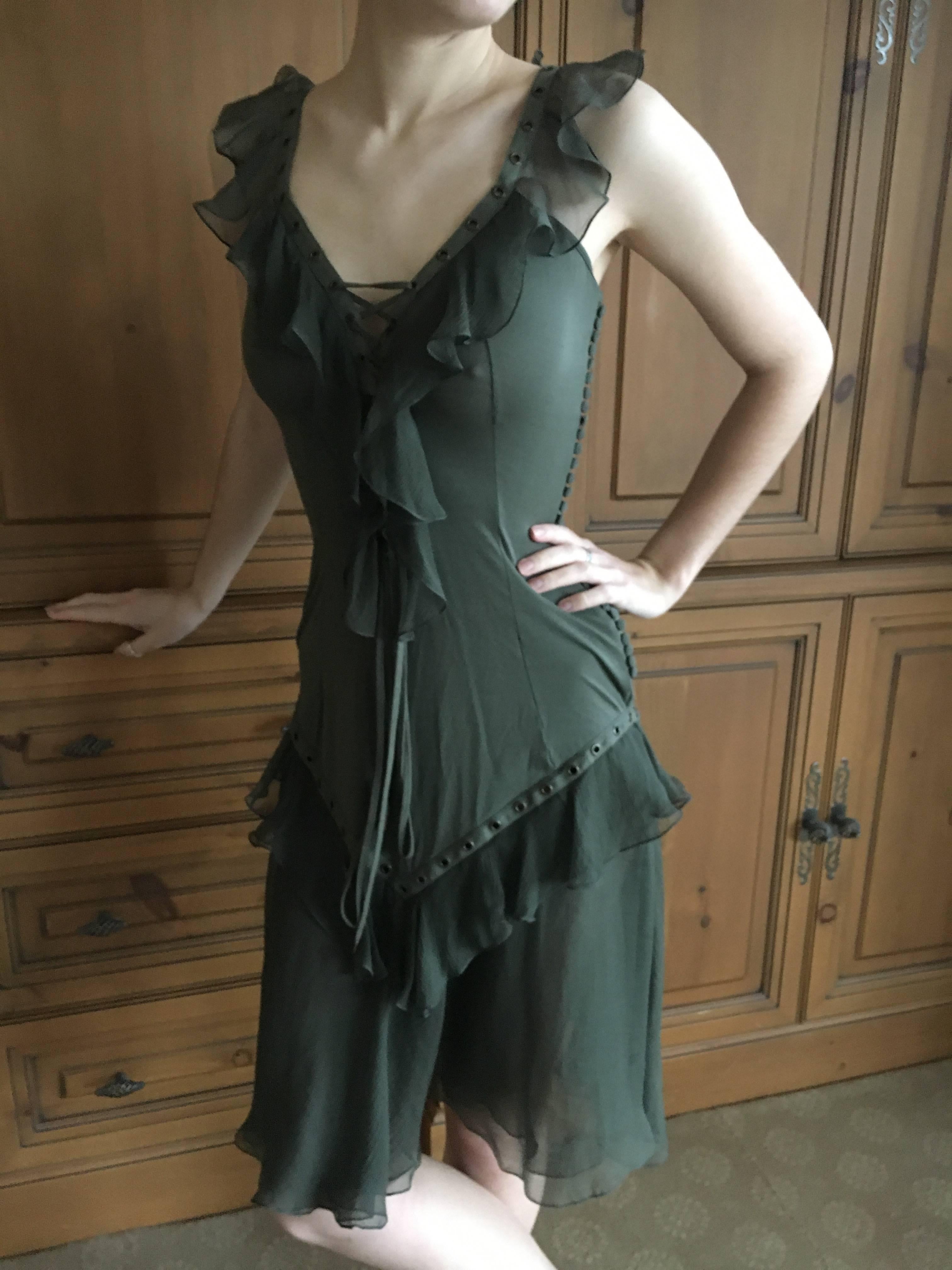 Christian Dior by John Galliano Moss Green Corset Lace Ruffled Silk Dress.
This is such a pretty dress in solid moss green. 
I have only seen this design previously in bold patterns, never a solid color.
Size 36
Bust 35"
Waist