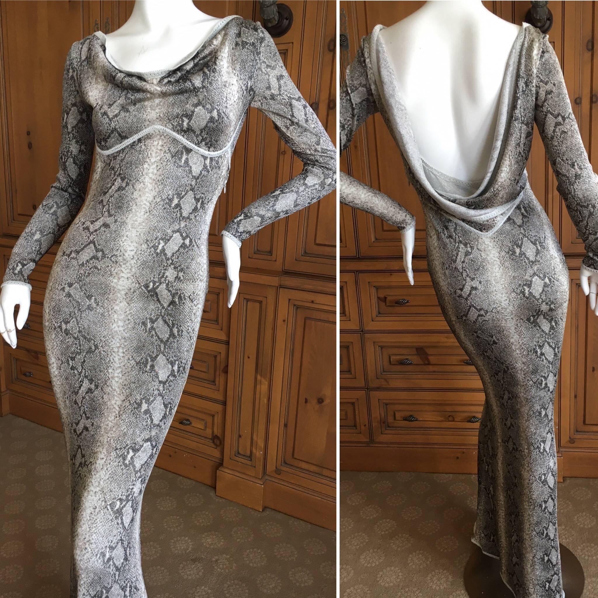 John Galliano 1997 Snake Print Scoop Back Evening Dress.
Stunning evening dress with one of the earlier Galliano label's, from 1997.
Low Scoop back, the photos don't capture the metallic threads in the fabric, this is much prettier in