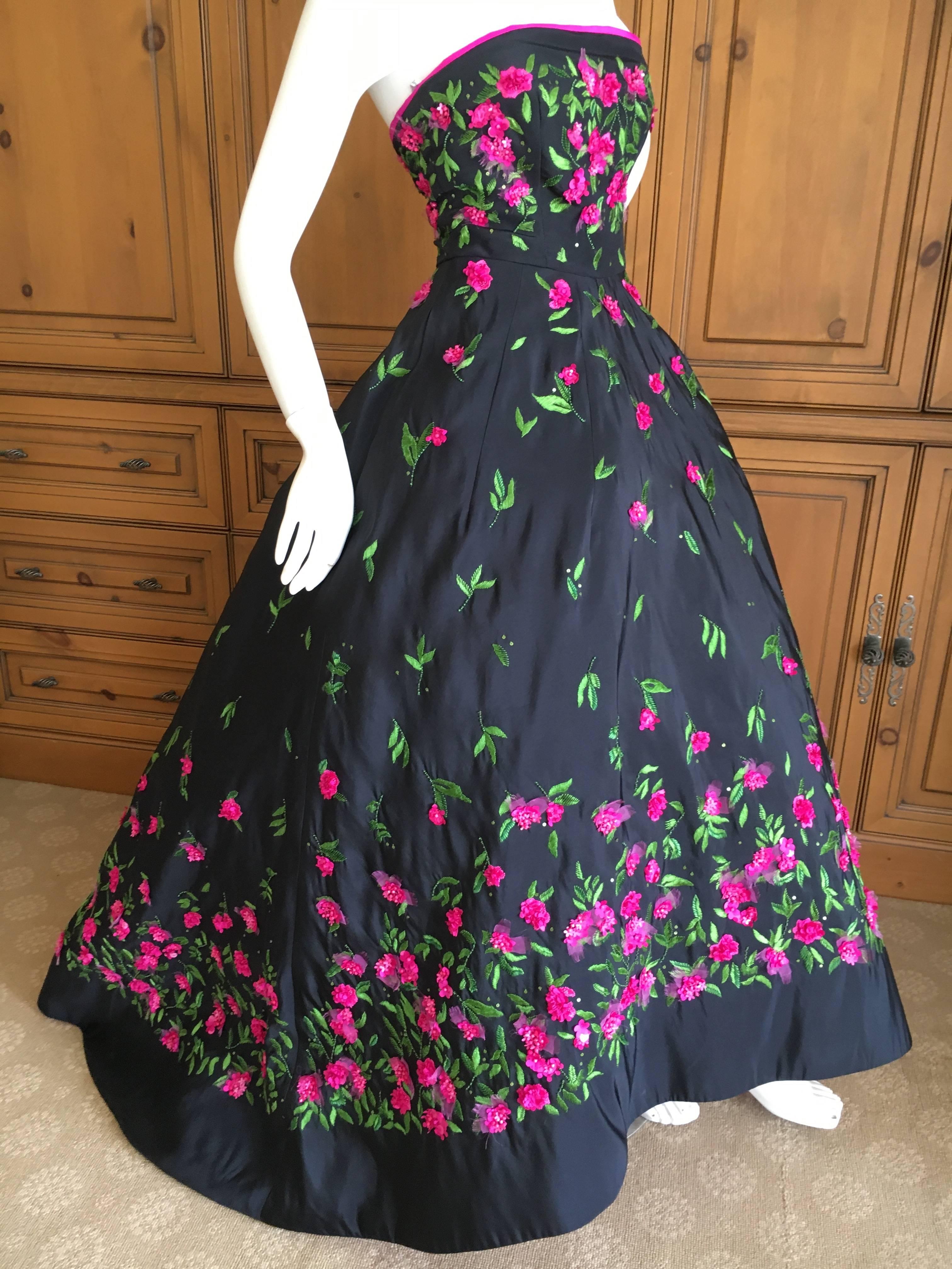 Oscar de la Renta exquisite black ball gown with floral embellishments.
Interior has multiple layers of tulle petticoats , this has the form of an 1860's ball gown.
Size 0
Bust 32"
Waist 25"
Hips 40"
Length 56"
Excellent condition