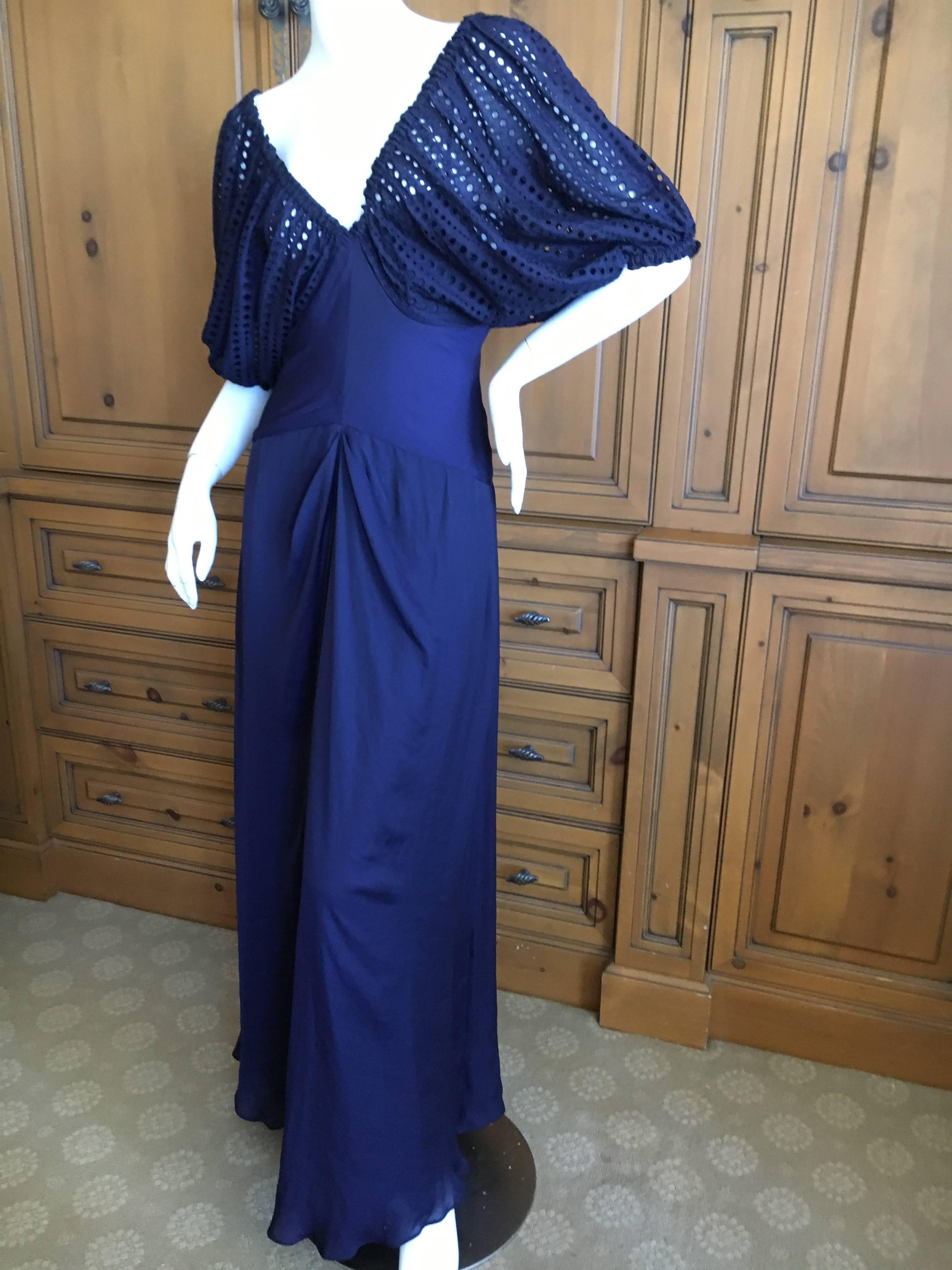 Jean Paul Gaultier Navy Blue Low Cut Evening Dress with Lace Eyelet Lace Sleeves.
So pretty, in a 30's inspired style.
Size 36
Bust 36"
Waist 30"
Hips  42"
Length 62"
Excellent pre owned condition