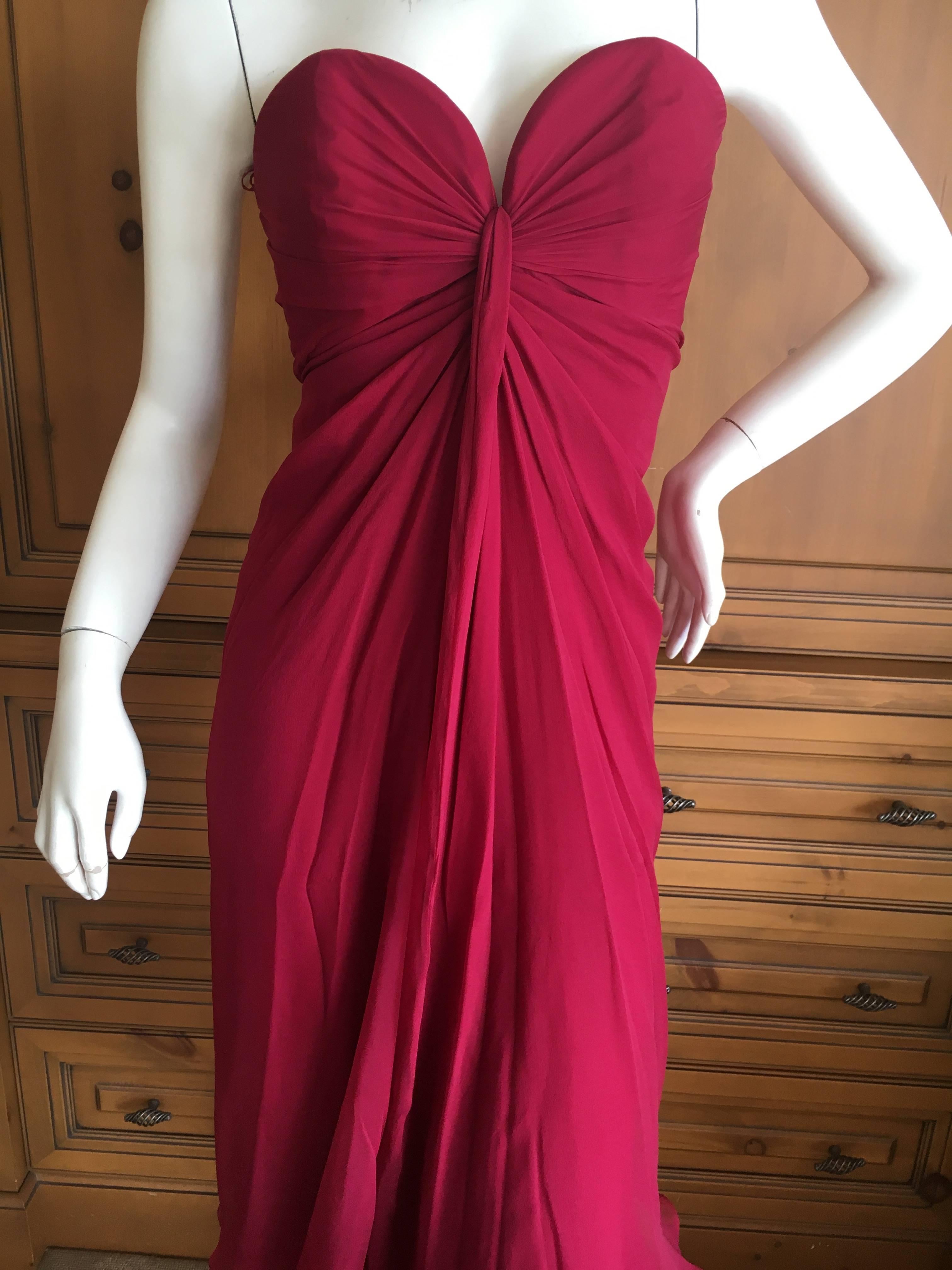 Yves Saint Laurent Red Silk Strapless Cocktail Dress.
There is a boned inner corset.
Size 40
Bust 38