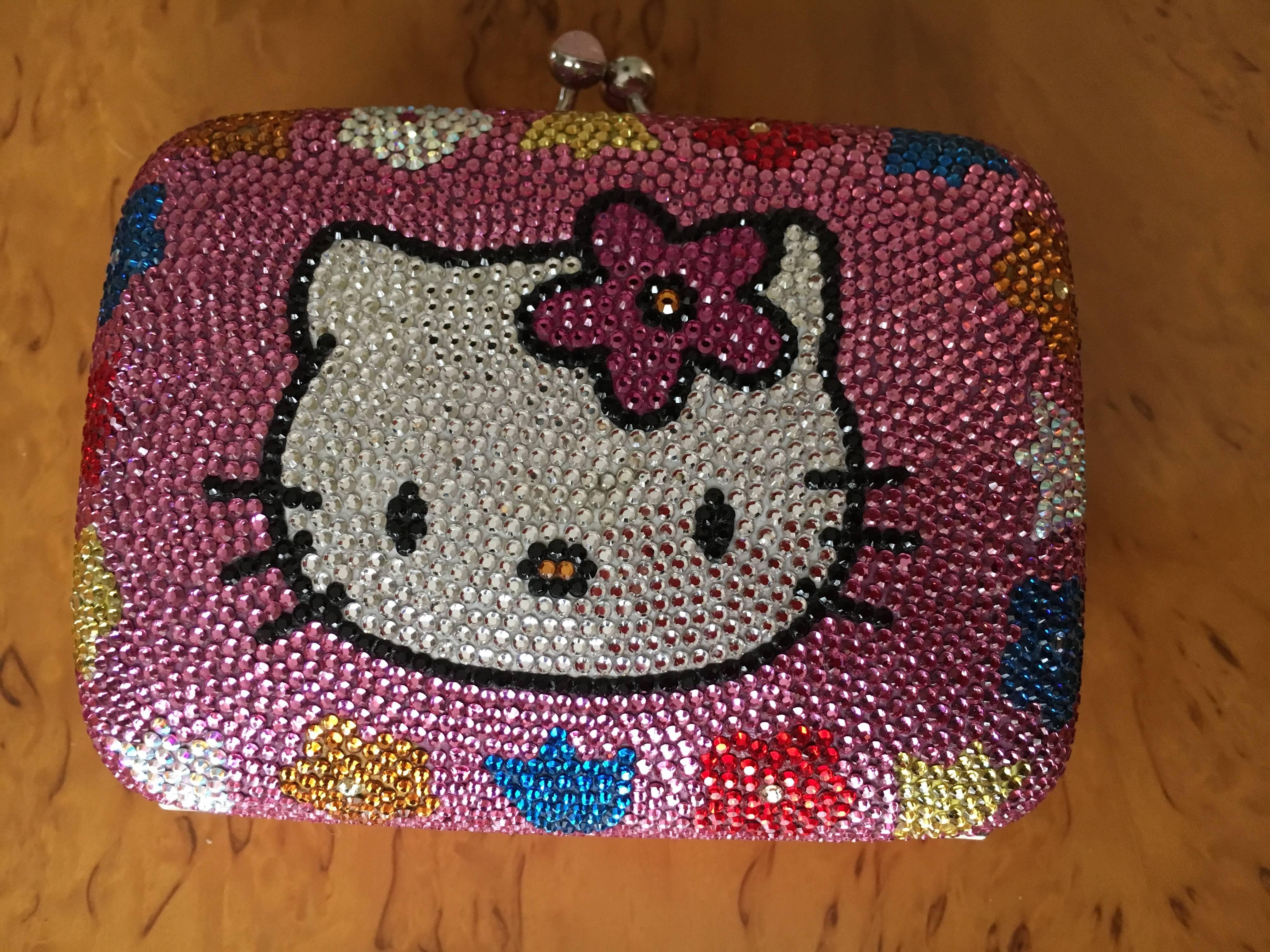 Delightful collaboration between Judith Leiber and Sanrio resulted in this mini minaudière .
4" x 3.5
Excellent condition