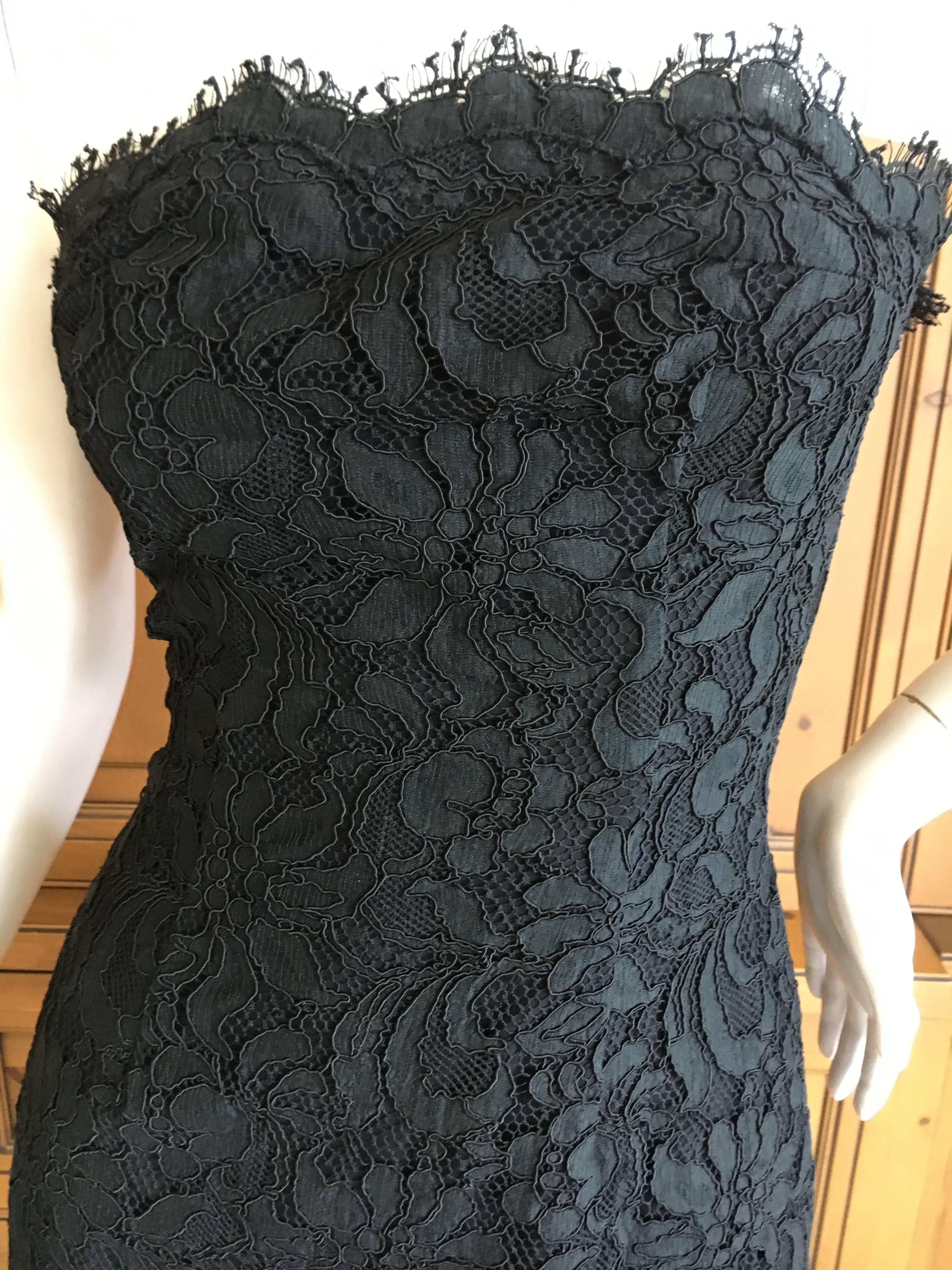 Exquisite Christian Lacroix Black Lace Strapless Mini Dress.
Lacroix was a master of fashioning lace, a legacy of his Arles upbringing , and this is a wonderful example.
Simple and sweet
Marked size 38 but it is tiny
Bust 34