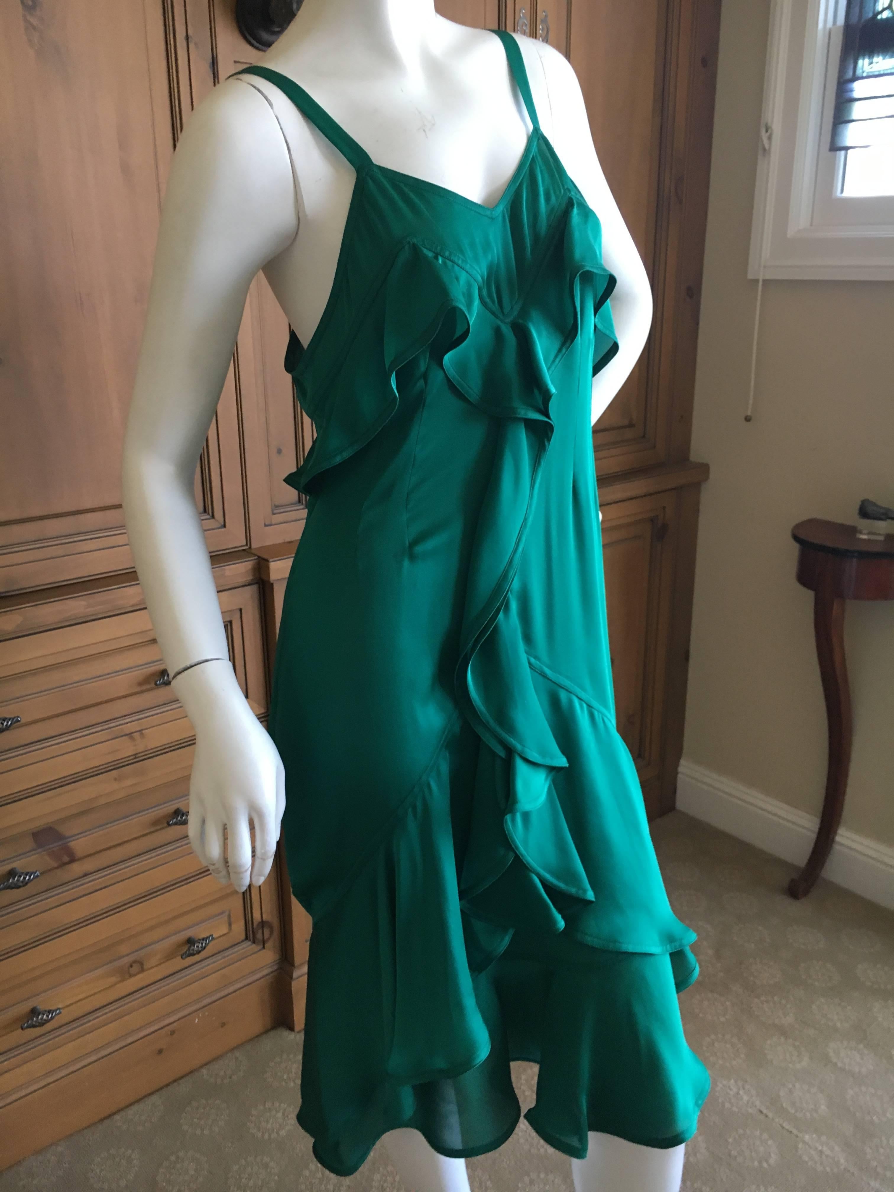 Yves Saint Laurent Tom Ford Fall 2003 Look 1 Green Ruffle Dress.
Exquisite green silk dress from Tom Ford YSL. This version is in silk with edging on the ruffles. I have never seen this version, most are raw edged.
Size 42
Bust 39"
Waist
