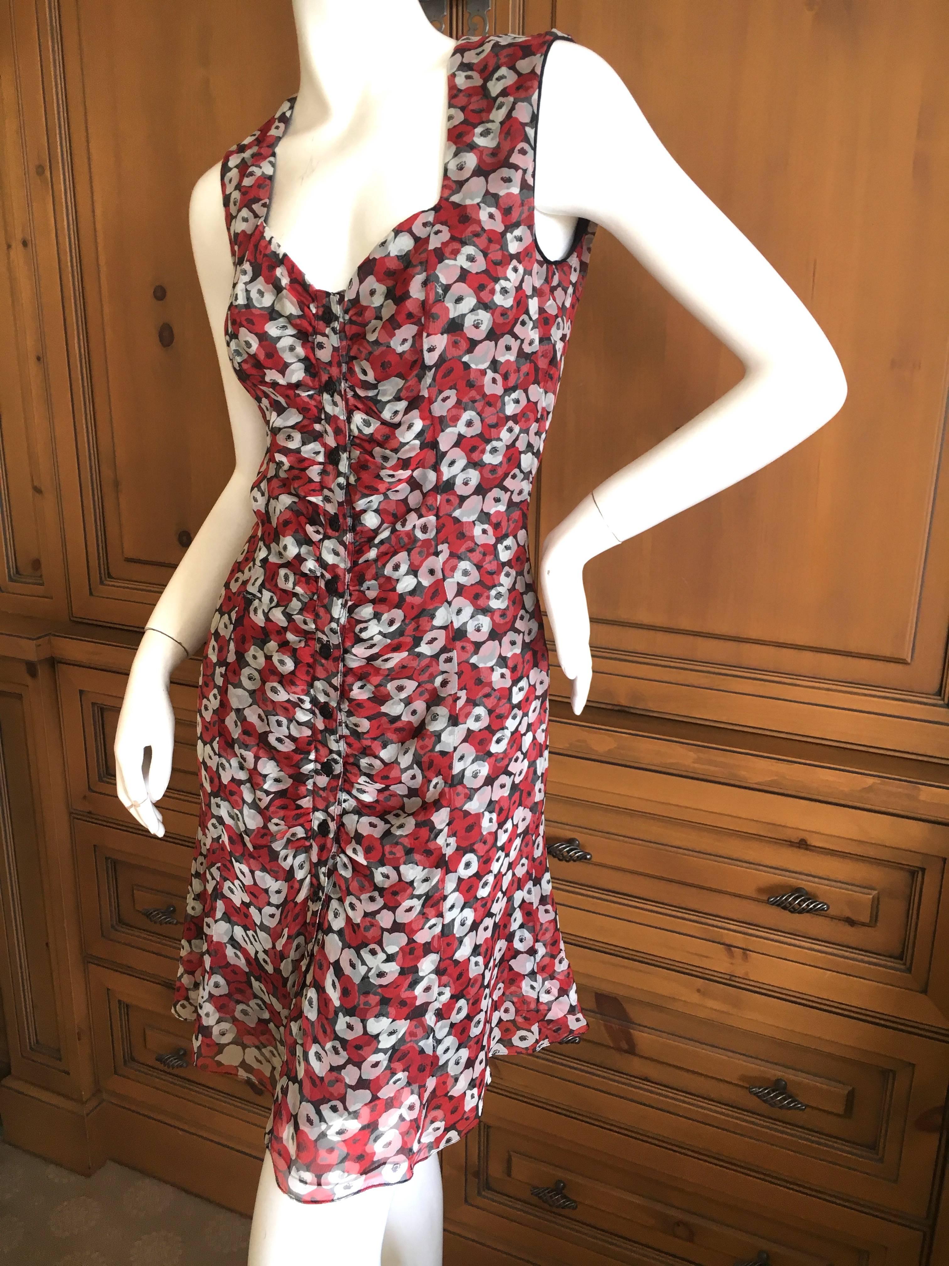 Yves Saint Laurent Rive Gauche Poppy Print Sun Dress.
So sweet,buttons up the front.
Size 36
Bust 36"
Waist 26"
Hips 40"
Length 36"
Excellent condition
