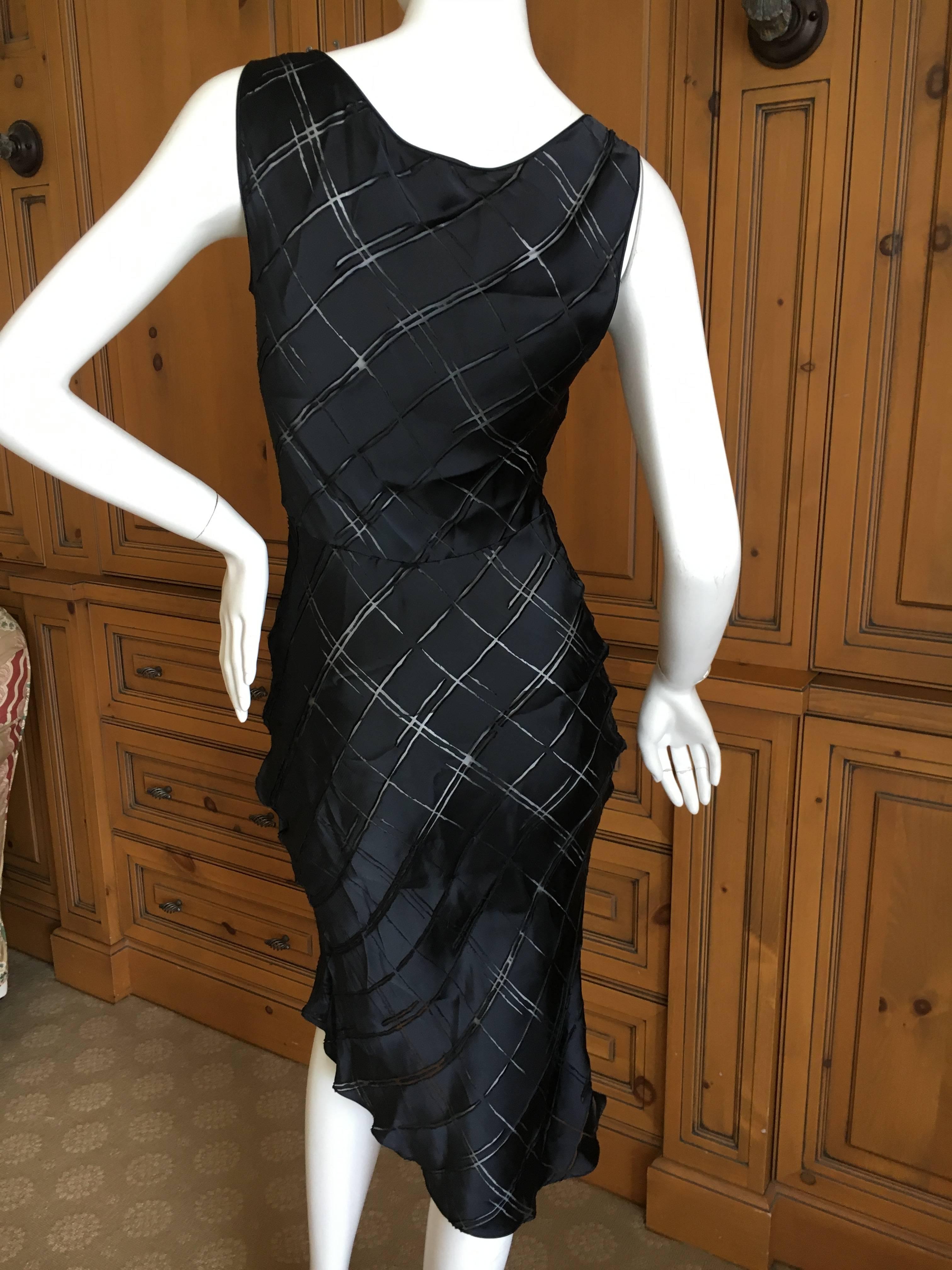 John Galliano Late 80's Silk Blend Sheer Little Black Dress
Silk viscose blend
Size 38
Measurements to follow