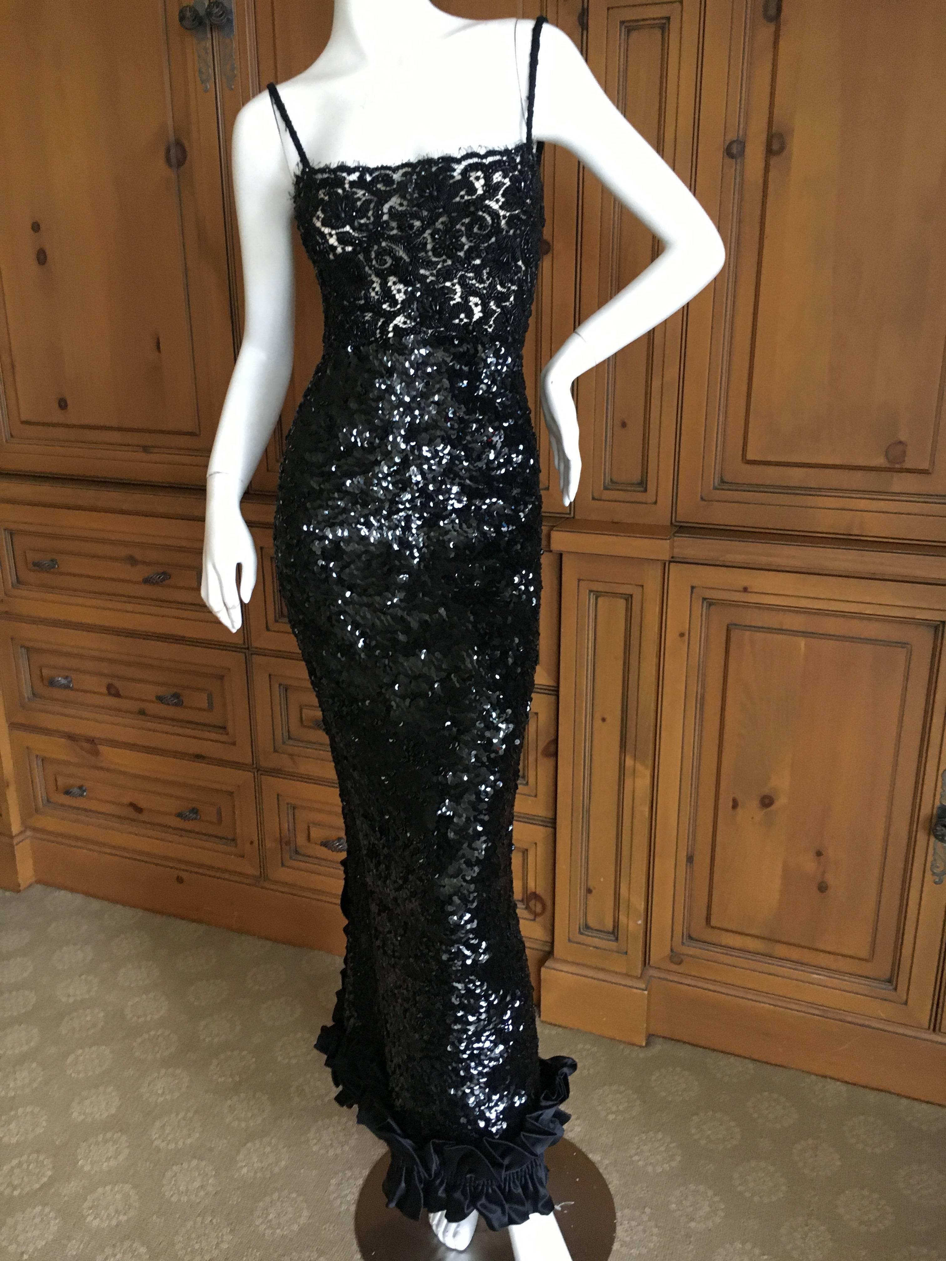 Galanos for Martha Park Avenue Embellished Black Sequin and Lace Evening Dress.
This is simply astonishing, the hand work involved.
The embellished , beaded lace is sheer, and extends all the way down both sides. 
The embellished beaded lace on the
