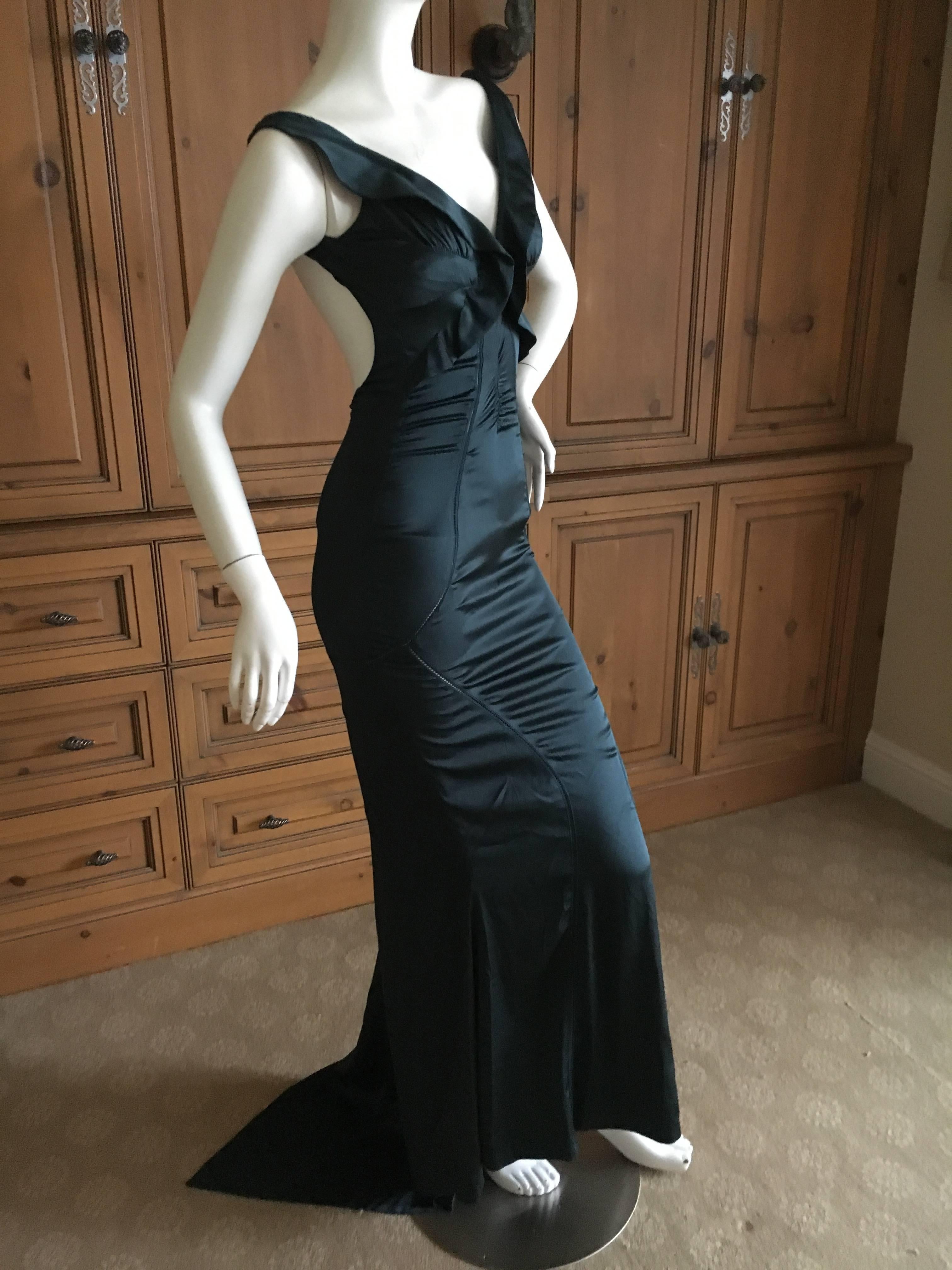 Gucci by Tom Ford Sexy Backless Green Silk Evening Dress.
This is so pretty, photos don't capture this.
Size 40
Bust 36