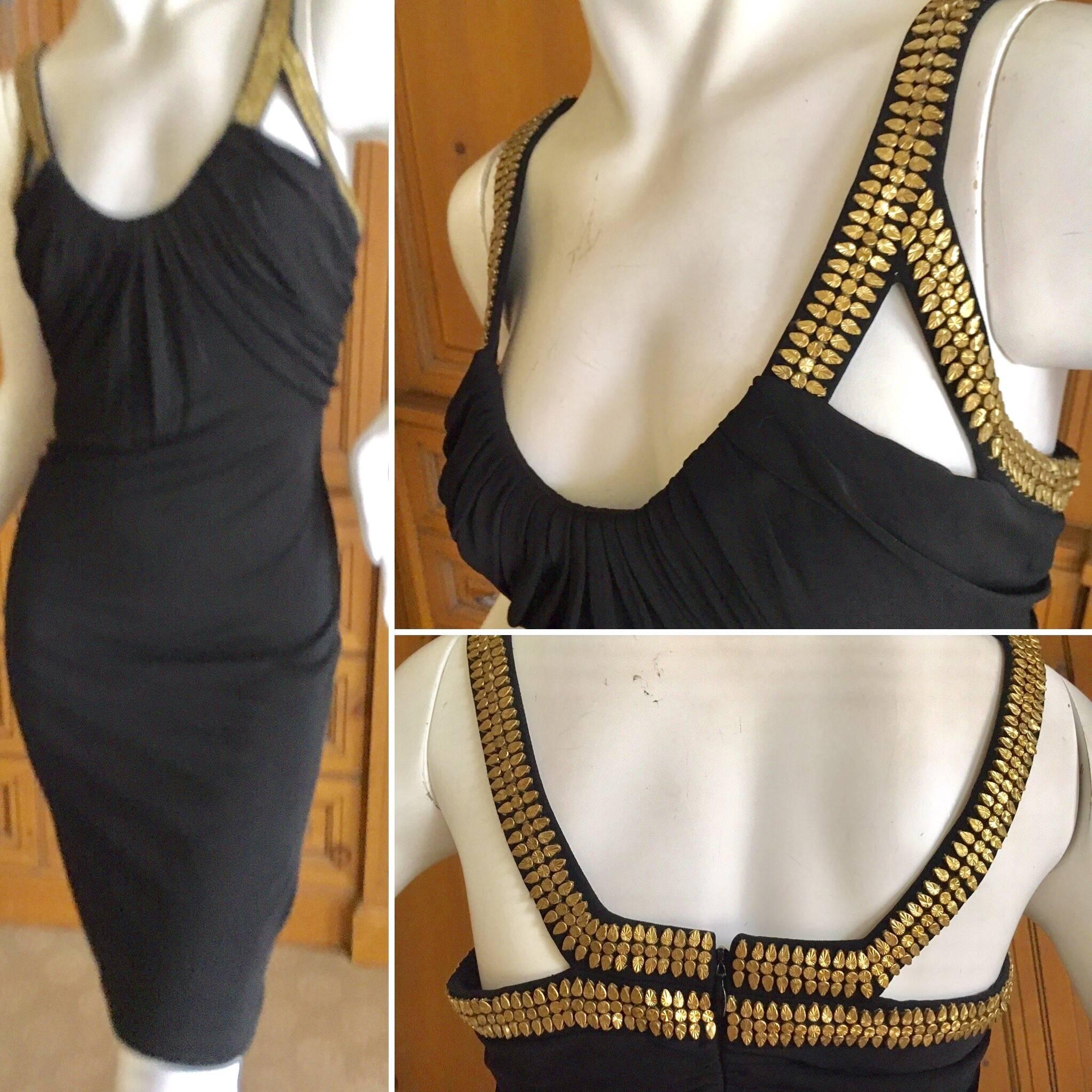 Versace Vintage LBD with Gold Studded Accents.
So pretty.
Size 40
 Bust 38" 
Waist 30" 
Hips 40" 
Length 42"
 Excellent condition