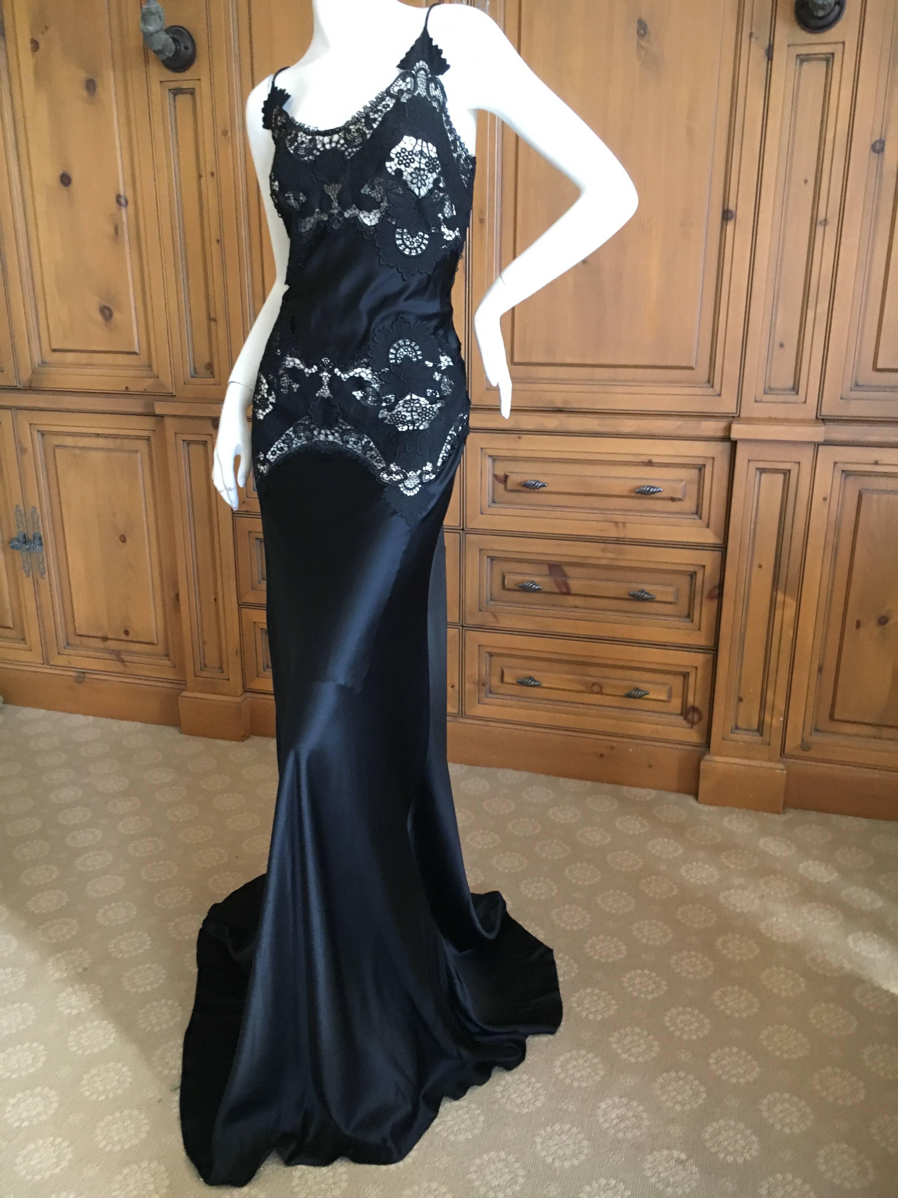 Alexander McQueen Black Evening Dress with Sheer Guipure Lace Details.
Hard to find size 46

Bust: 36"
Waist: 32"
Hip: 40"
Length: 70"