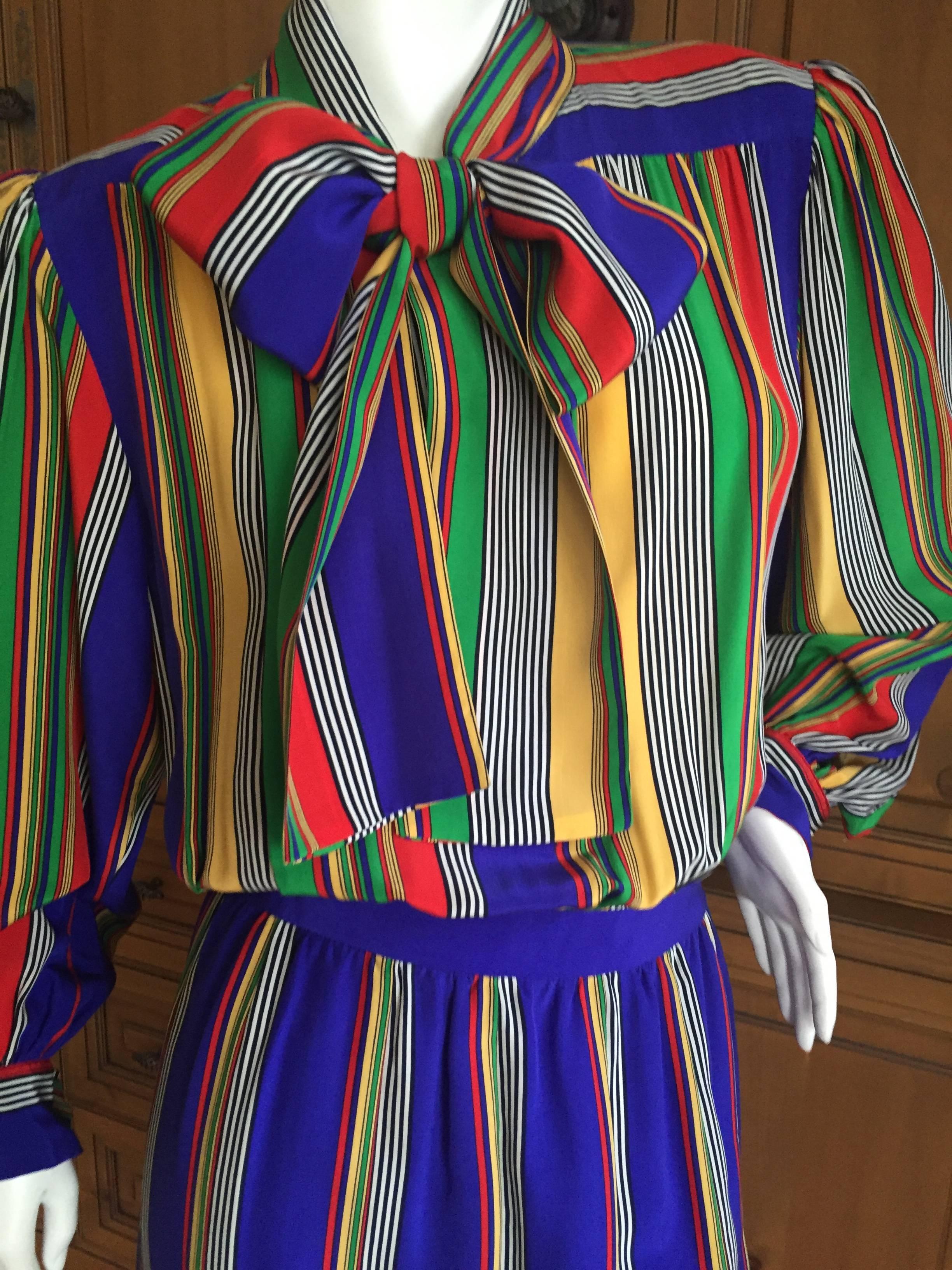 Yves Saint Laurent Rive Gauche 1970's Stripe Silk Day Dress with Bow.
So delightfully French, with pleated skirt.
Size 36
Bust 42"
Was it 25"
Hips 38"
Length 42"
In excellent condition
