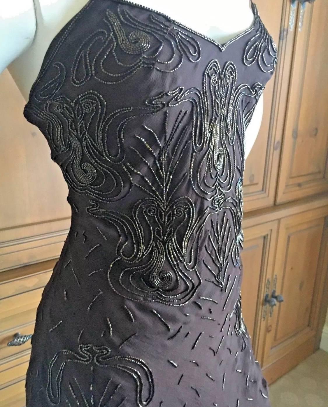 Christian Dior vintage brown silk chiffon cocktail dress by Galliano.
Silk buttons on the side, with beautiful beadwork in copper color beads.

Please use zoom feature to see, it is hard to photograph, but so pretty.
 Size 38 
Bust 36"
 Waist
