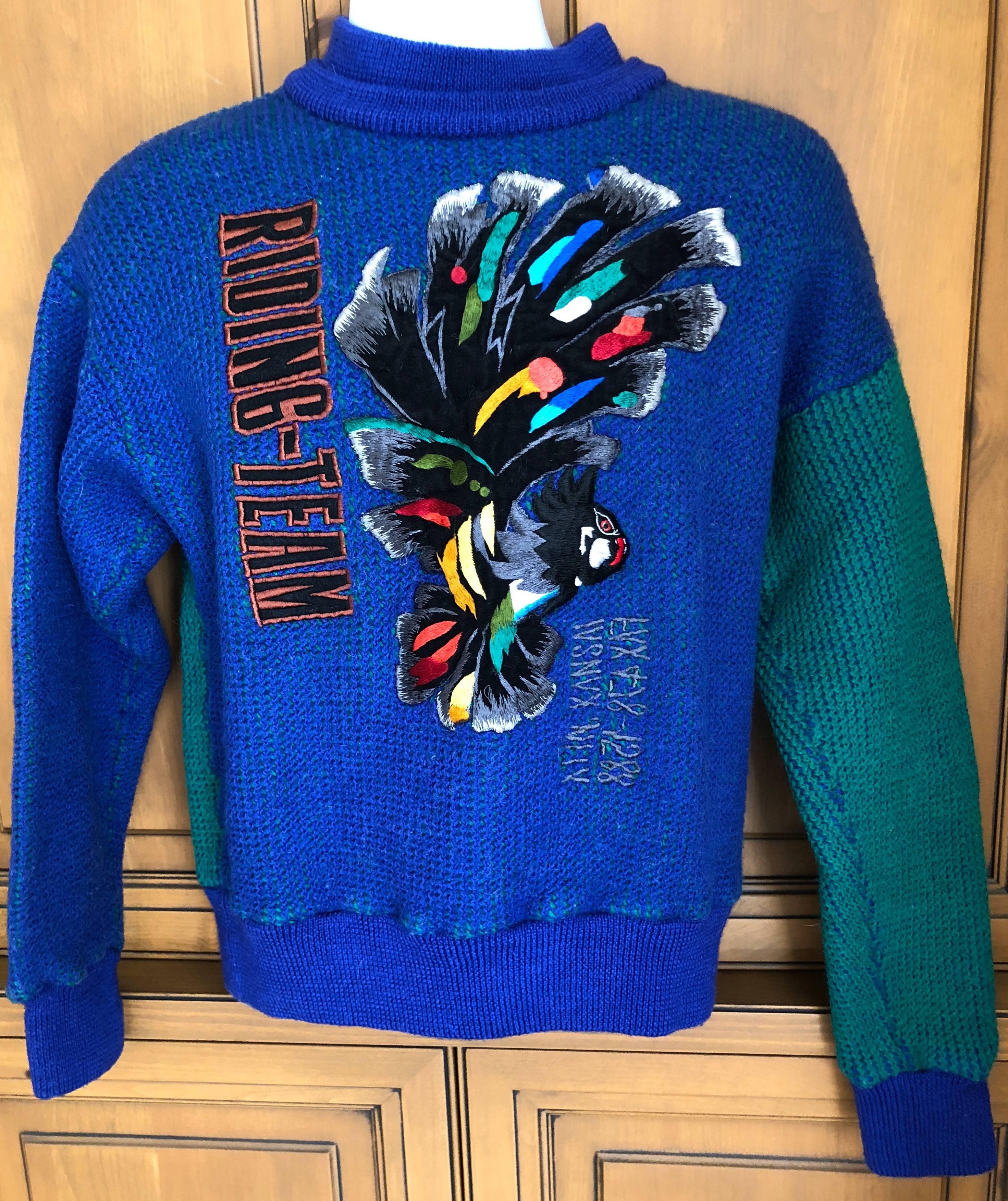 Kansai Yamamoto 1980's Men's Sweater with Bird Embellishment .
A predecessor of designers like Issey Miyake, Yohji Yamamoto, Kenzo Takada, and Rei Kawakubo, Kansai Yamamoto was the first Japanese designer to show in London in 1971. He eventually