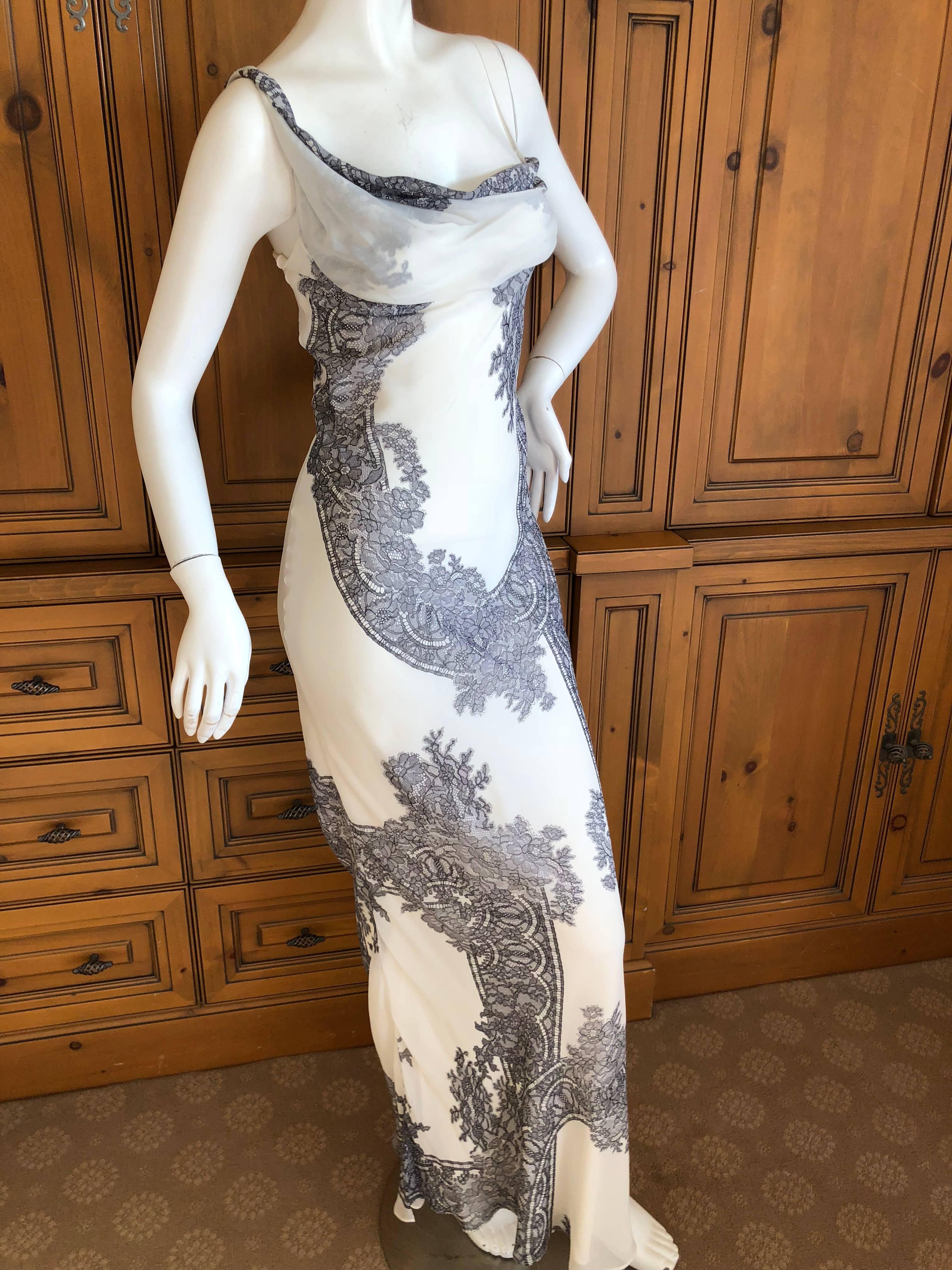 John Galliano Vintage Lace Print Cream and Black Silk Evening Dress

Size 4

 Bust 36" 

Waist 31"

 Hips 41"

 Length 61"

Excellent condition
