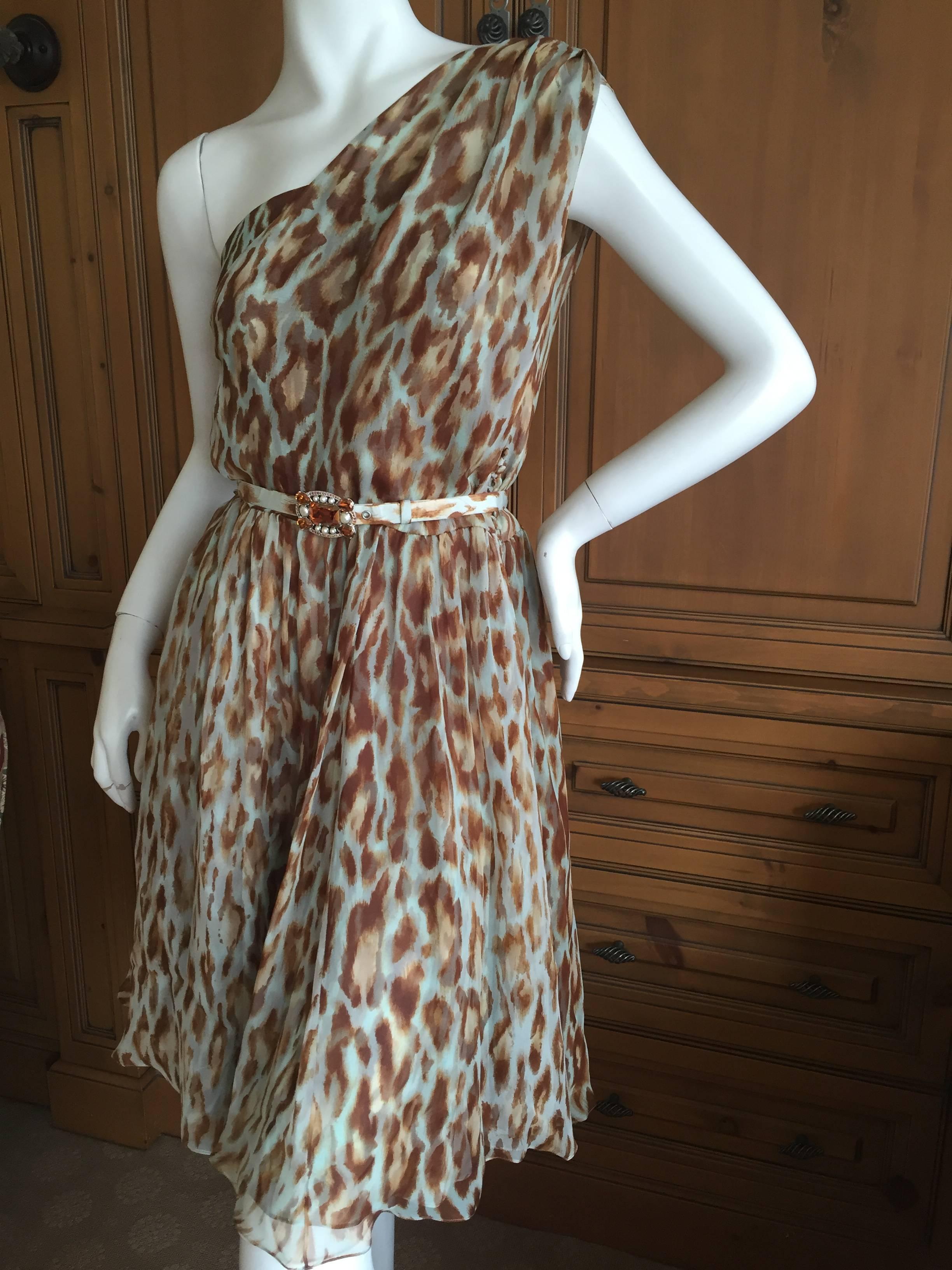 Beautiful leopard print silk one shoulder dress by Galliano for Christian Dior.
With jeweled belt.
Size 36
Bust 36"
Waist 26"
His 42'
Length 40"
Excellent condition