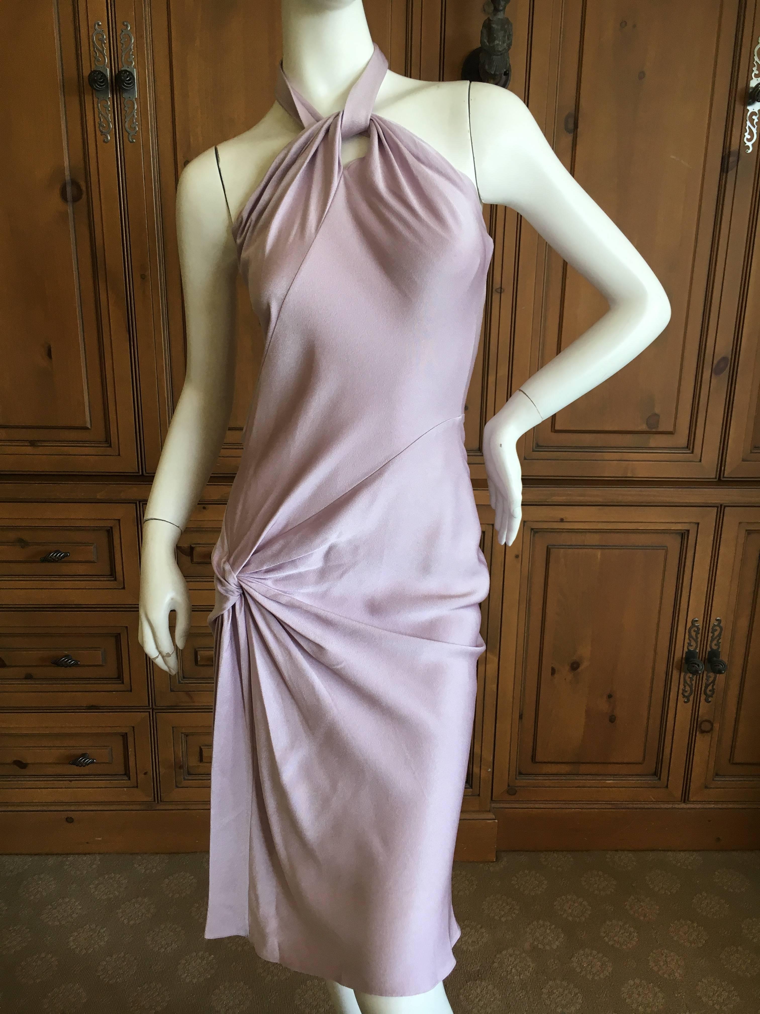 Christian Dior by John Galliano Sweet Pink Day Dress with Knot Motif.
So sweet, with a halter top .
Size 36
 Bust 34" 
Waist 30"
 Hips 39"
 Length 46"
 Excellent condition