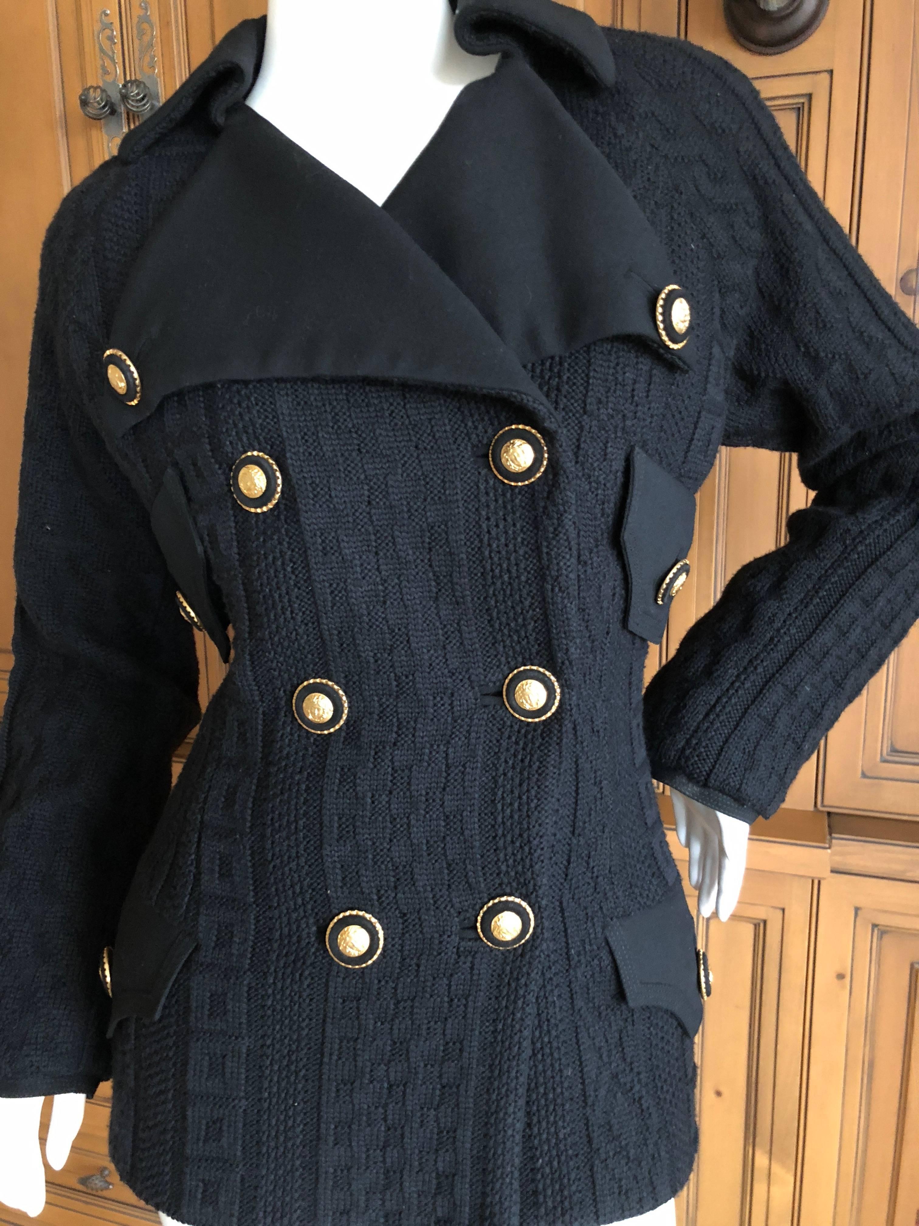 Gianni Versace Couture 1980's Black Knit  Jacket with Medusa Buttons.
Looks like a sweater , but is constructed as tuxedo jacket, with full lining.
SO beautiful, perfect gift for  the Versace lover.
 
Size 42 
Bust 38