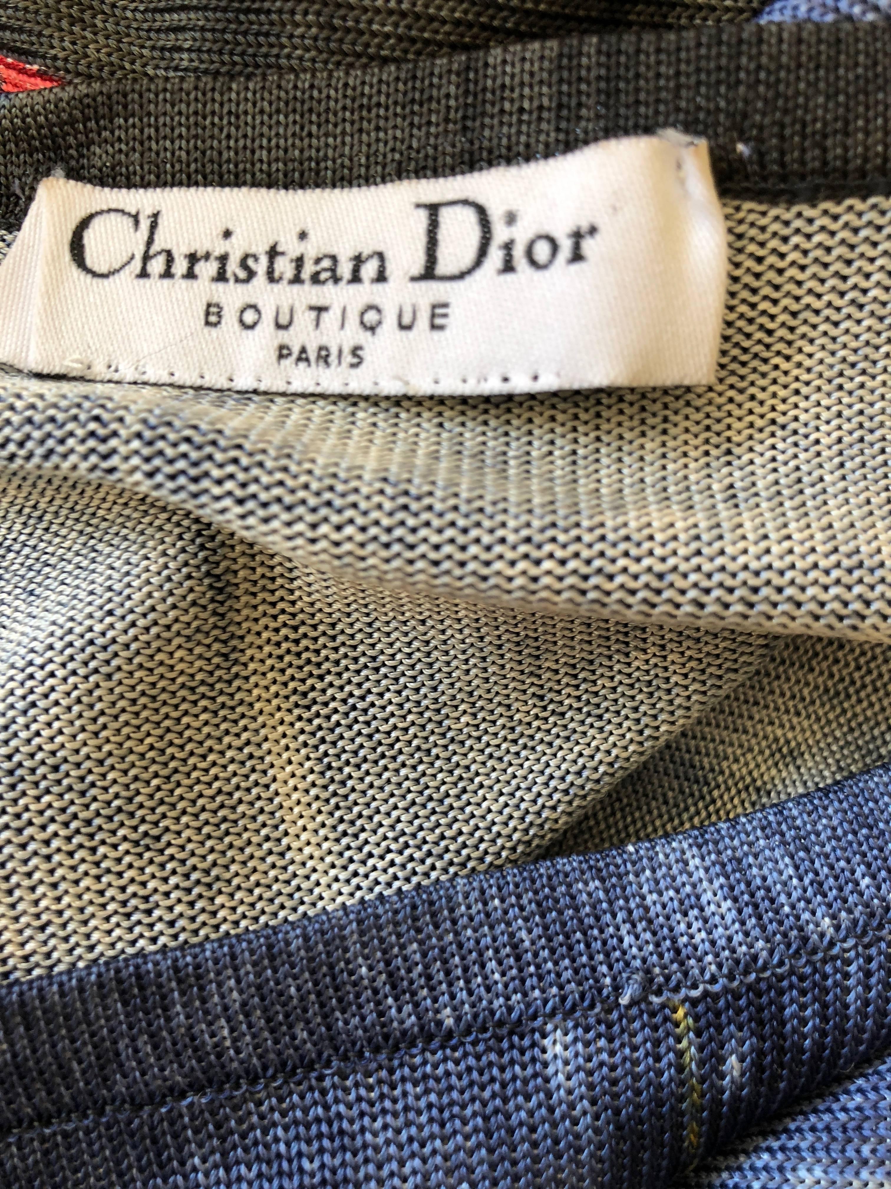 Christian Dior by John Galliano knit top with trompe l'oeill denim with patches including"  I Heart Sex "
Bust 34"
Waist 28"
Length 21"
Excellent condition