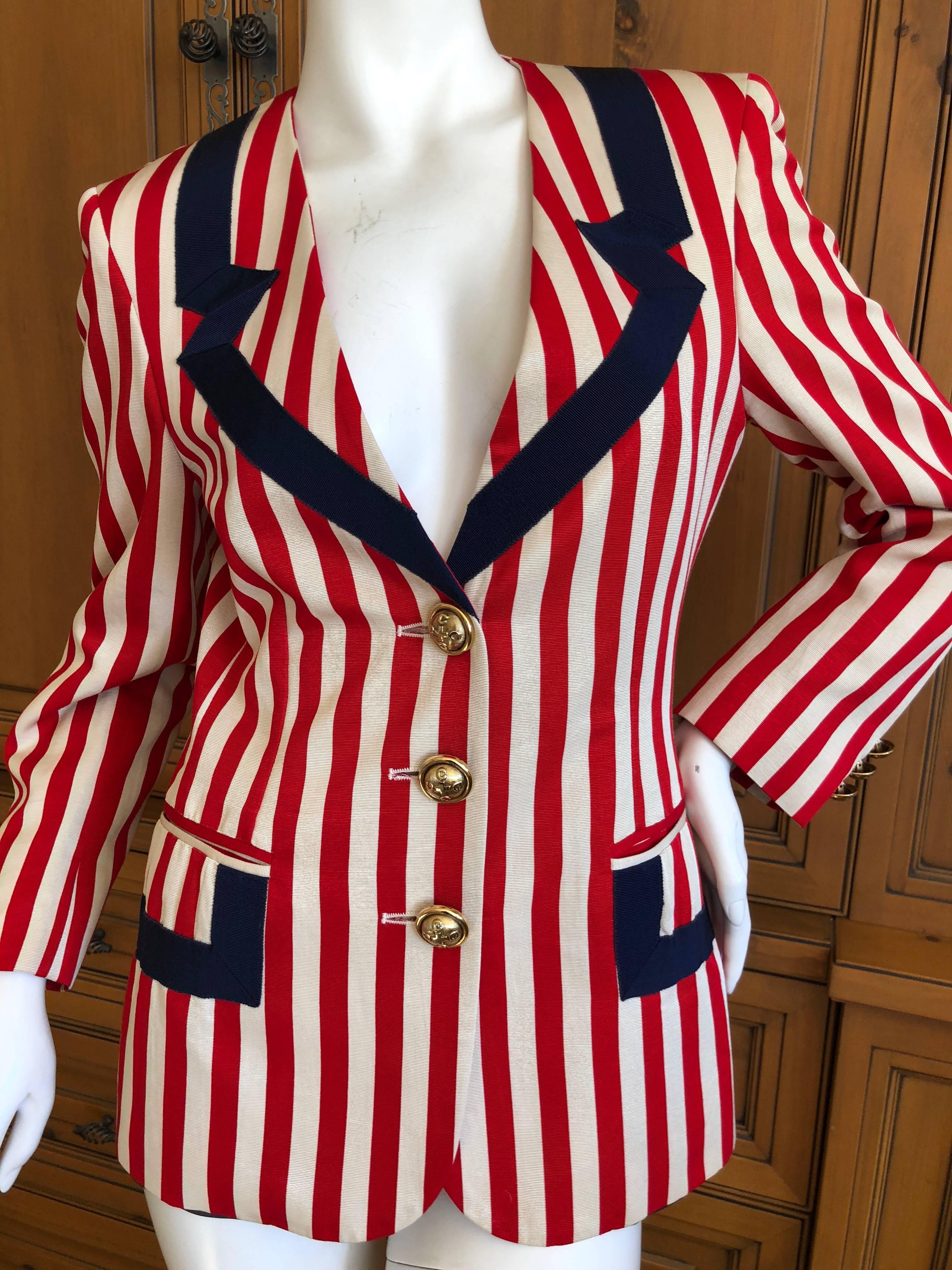 Wonderful red white and blue  jacket from Moschino from the 1993 collecton from Cheap and Chic.
Contrasting red, white and blue, made with  grosgrain ribbon tromp l'ceil details .
Size 6
Bust 36