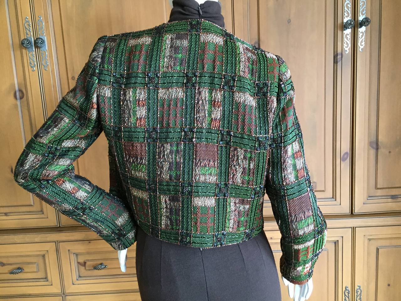 Bob Mackie Beaded Tartan Jacket
The jacket is a delightful tartan pattern embellished with beading and jet crystals, subtle and sublime.
Jacket;
Bust 36
