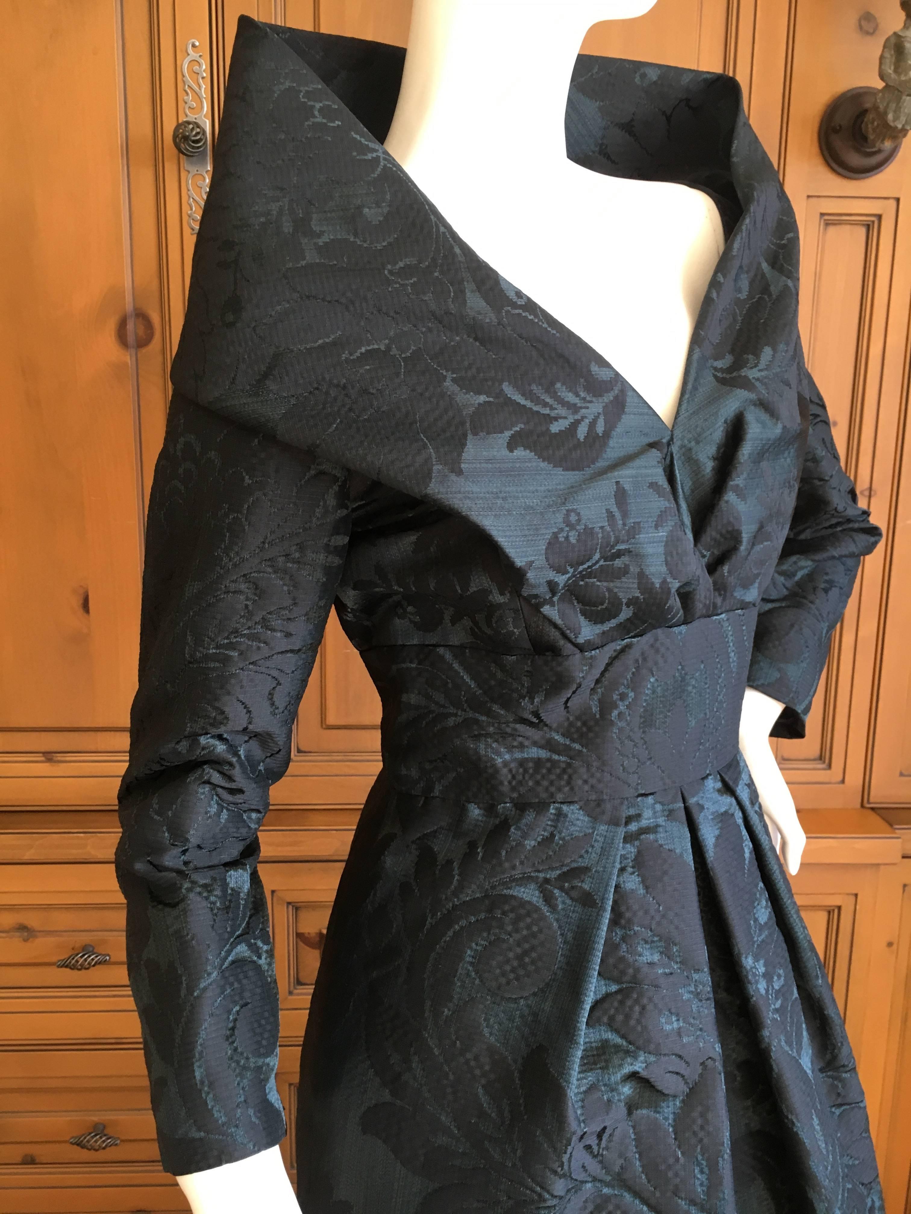 Oscar de la Renta Teal and Black Jacquard Evening Dress with Portrait Collar.
Simply Stunning.
Size 6
Bust 36