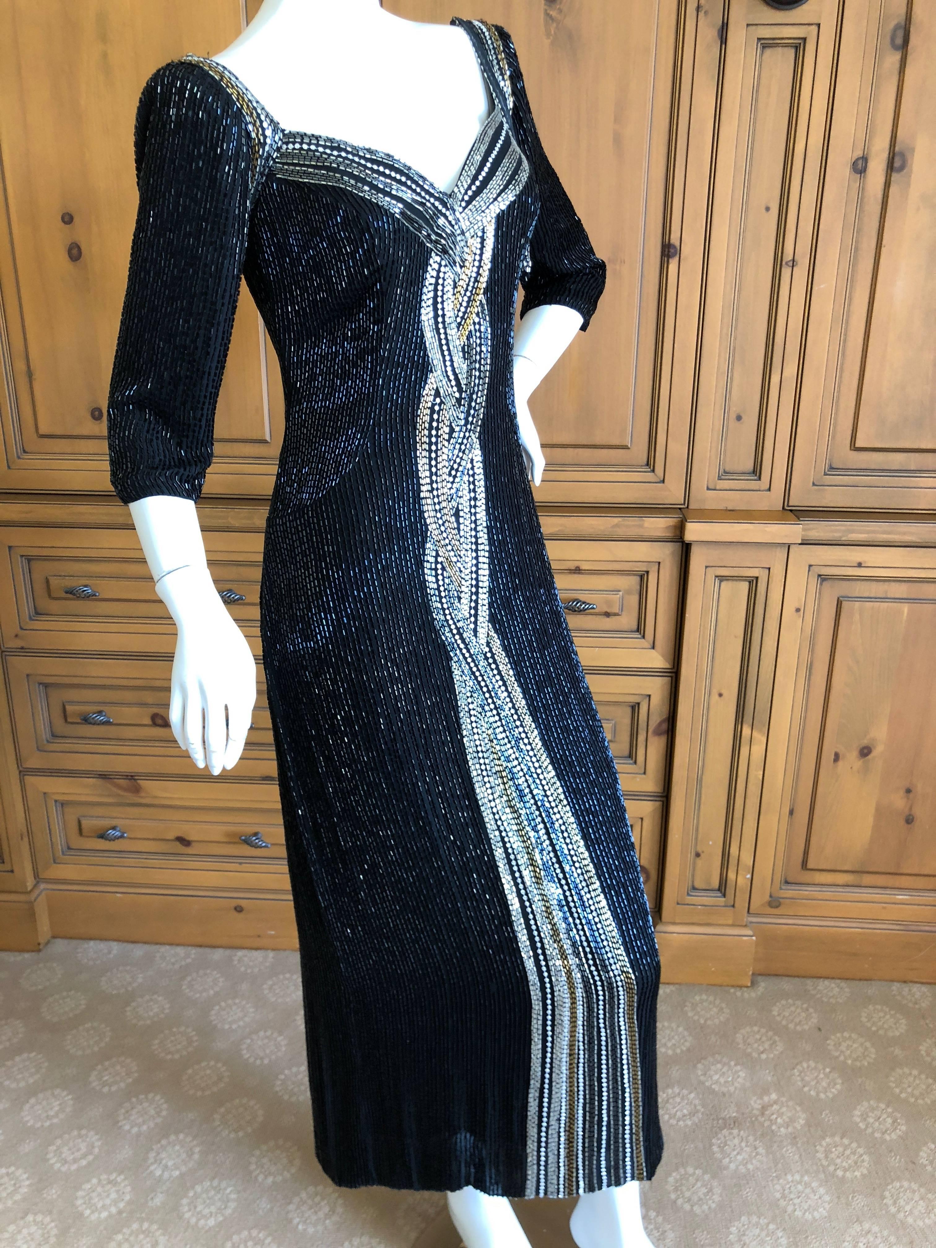 Bob Mackie Black Bugle Beaded Waterfall Evening Dress
Entirely embellished with black bugle beads, please use the zoom feature to see details.
Size 8
Bust 34