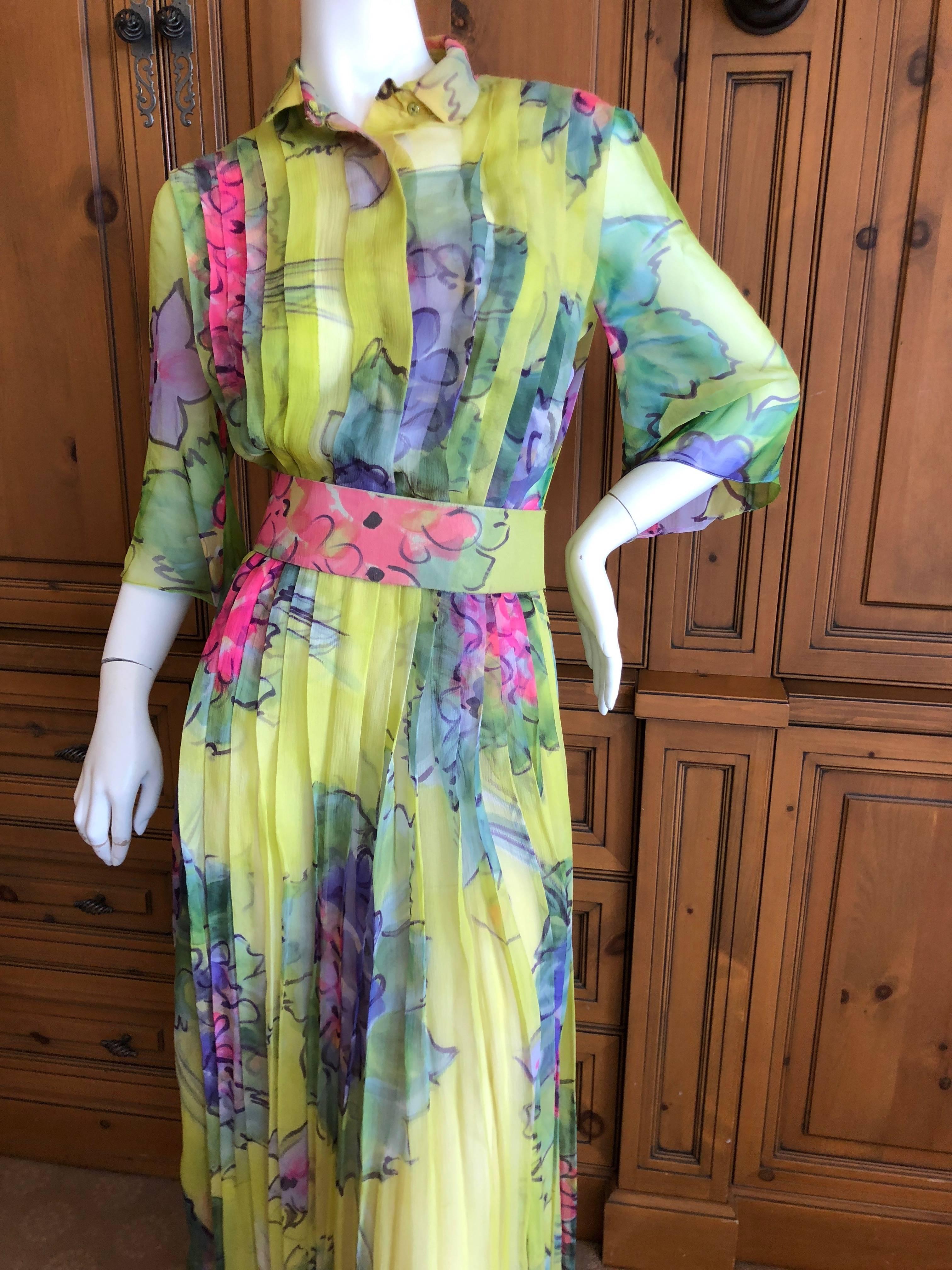 Cardinali Pleated Silk Chiffon Floral Evening Jumpsuit Dress with Belt.
Sadly this has damage on the back, see last two photos.

From the Archive of Marilyn Lewis, the creator of Cardinali
Cardinali was founded in Los Angeles in 1970, by Marilyn