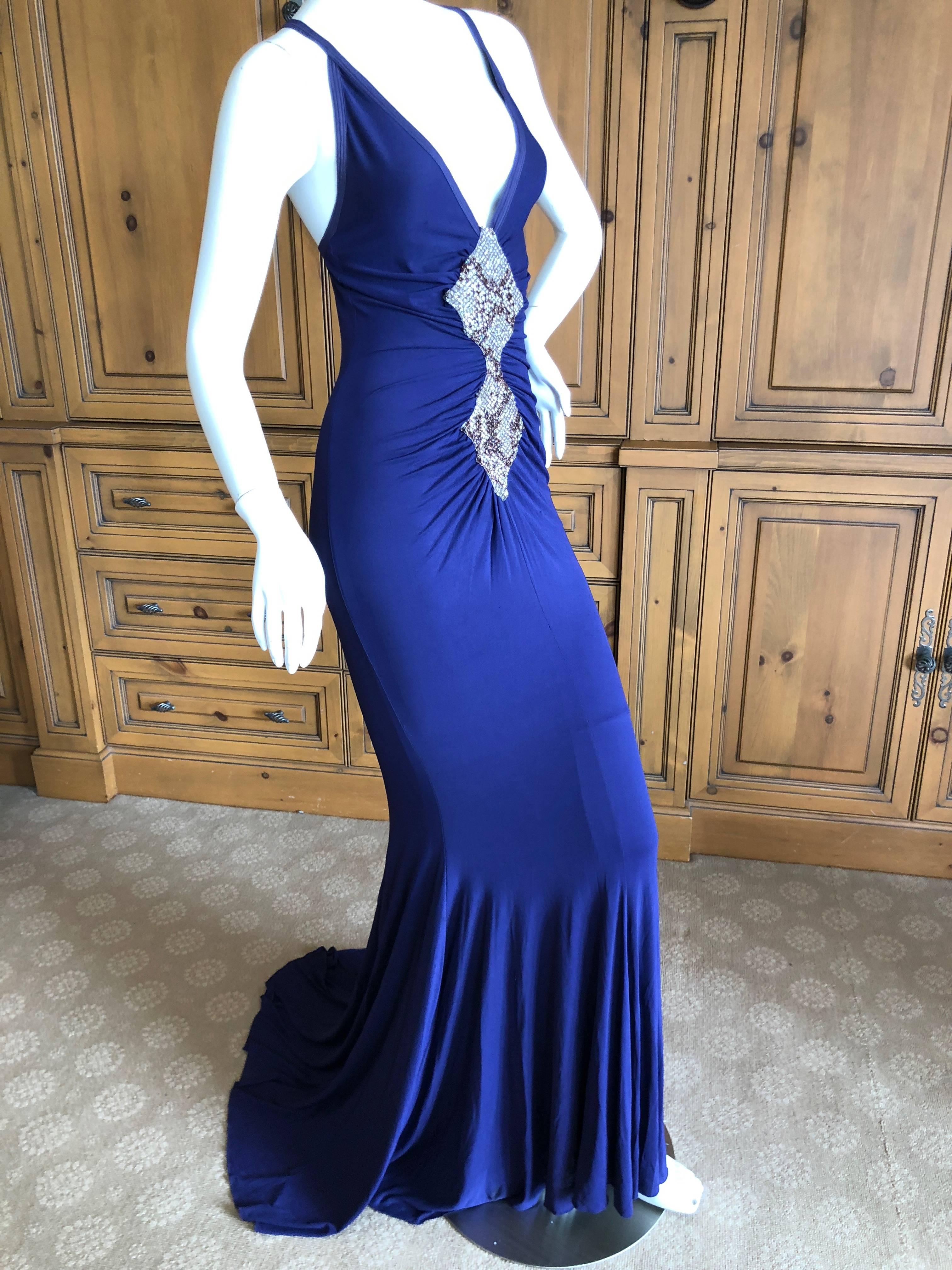 Roberto Cavalli Vintage Evening Dress .
So beautiful, with bead embellished bust in a python pattern.
There is no size tag, I estimate it to be European size 38

Bust  36