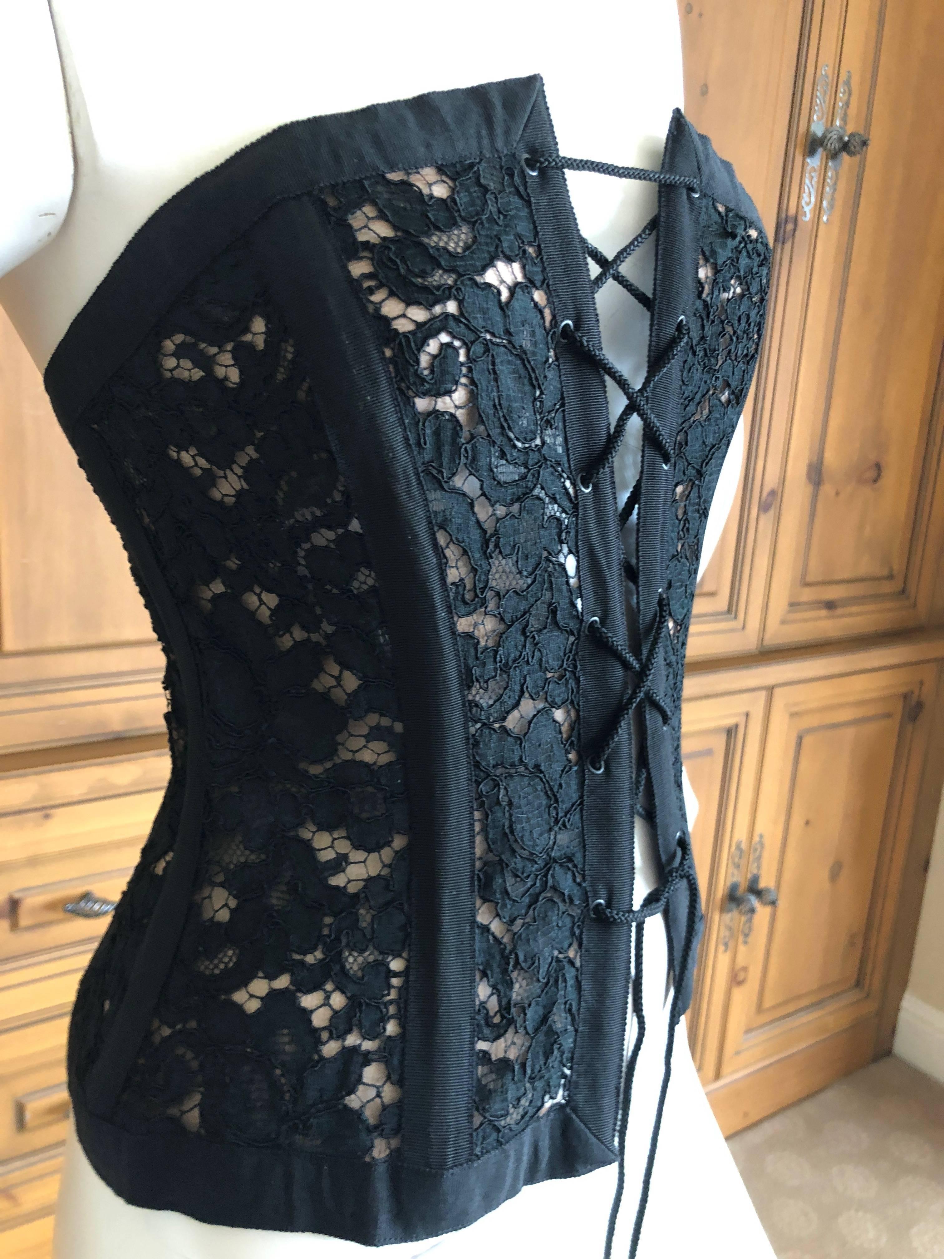 Yves Saint Laurent Rive Gauche 1970's Corset Lace Peasant Top.
The corset lace top has been a signature YSL Style since the beginning of the house.
This is a very early example of the corset lace up top,.
Size small
Bust 34