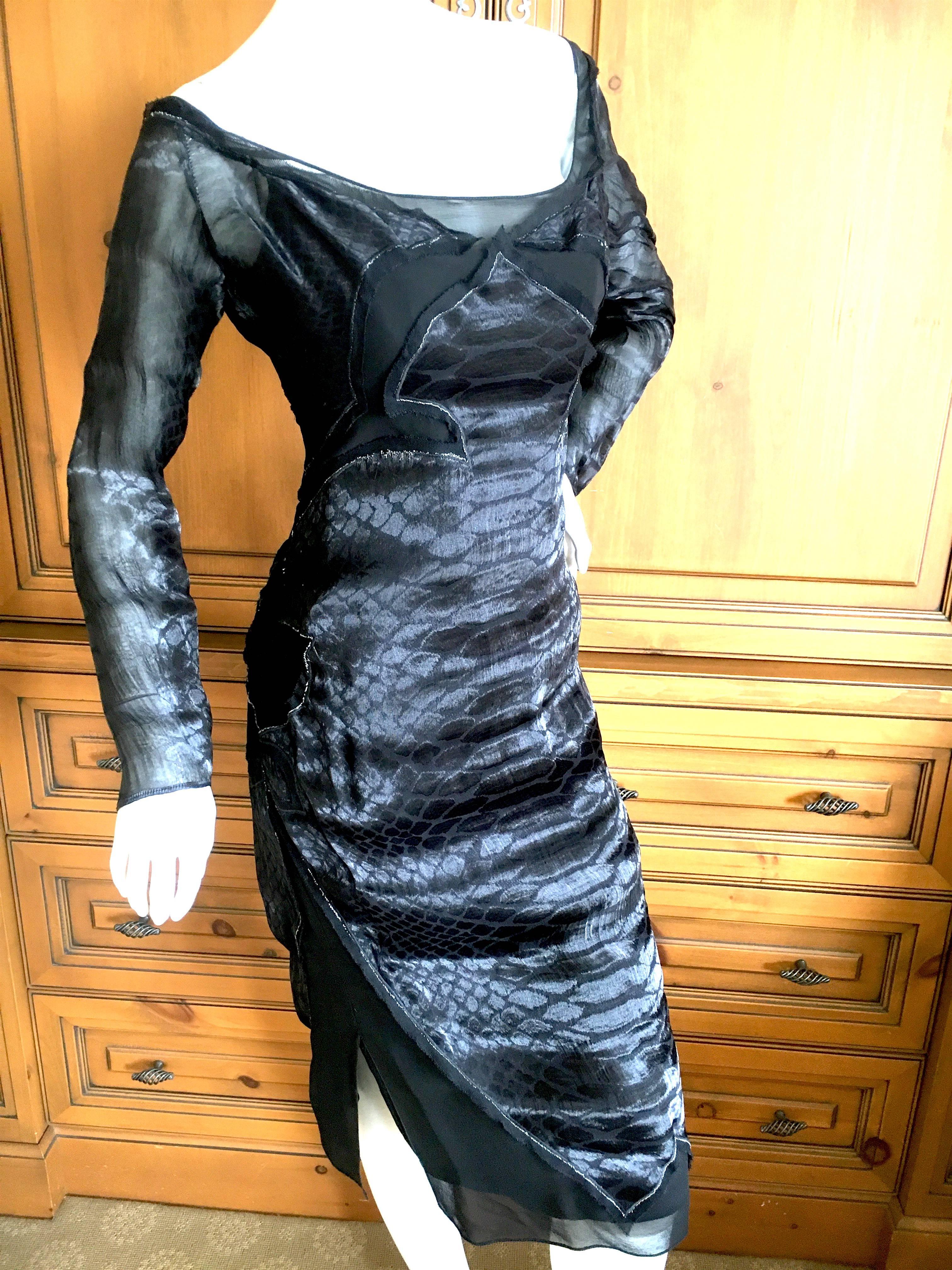 Yves Saint Laurent by Tom Ford Reptile Print Black Dress Fall 2004.
Wonderful Tom Ford YSL with sheer panels and silver threads , much prettier than the photos .
Size 42
Bust 40
