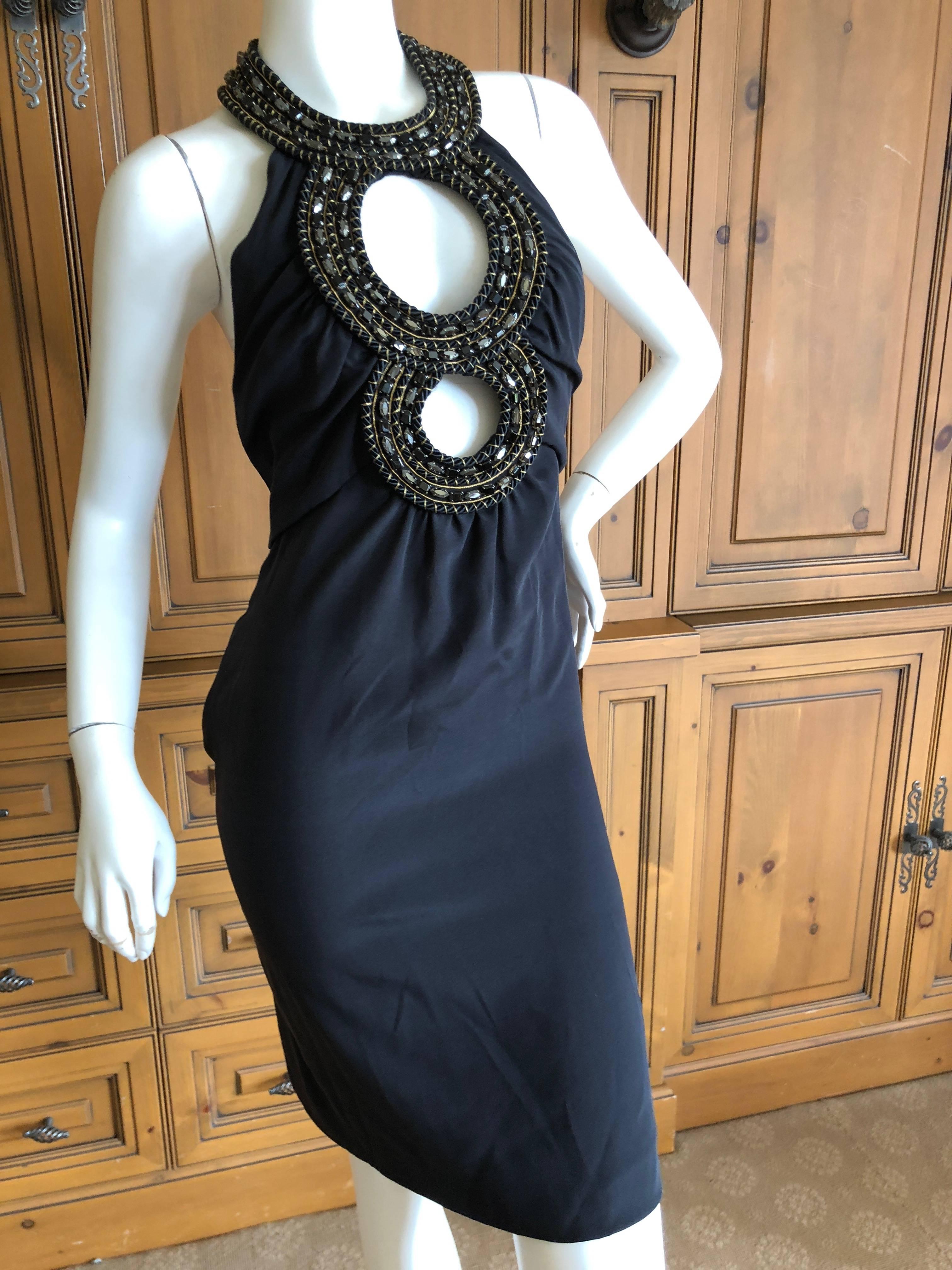 Azzaro Iconic Keyhole Backless Dress with Crystal and Cording Details
This is such a pretty piece. 
No size tag appx size 38 Eu
Bust 36