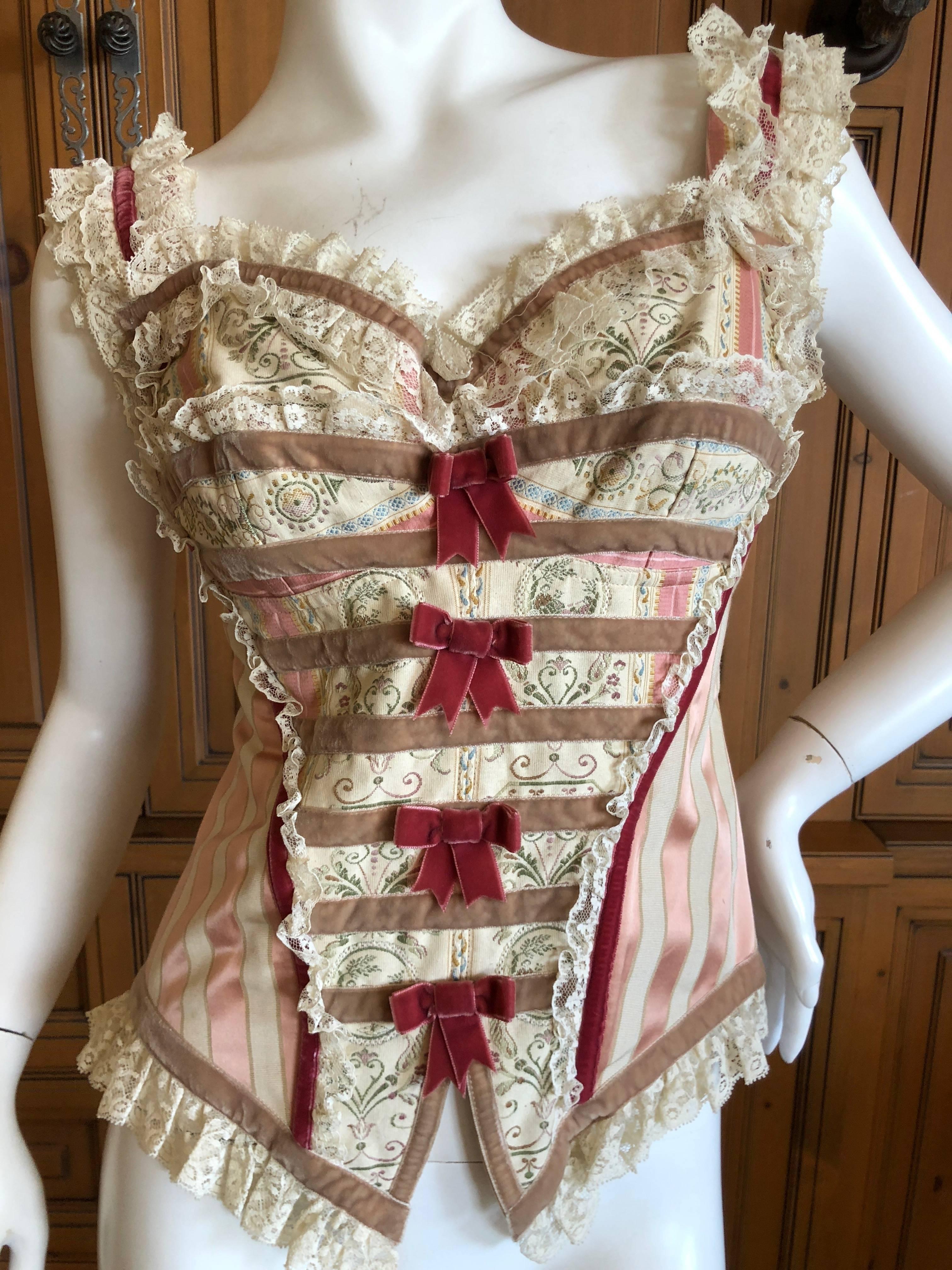 Dolce & Gabbana Romantic 1980's Vintage Corset Bustier Top
This is so pretty, zips up the bac
Size 42
Bust 34