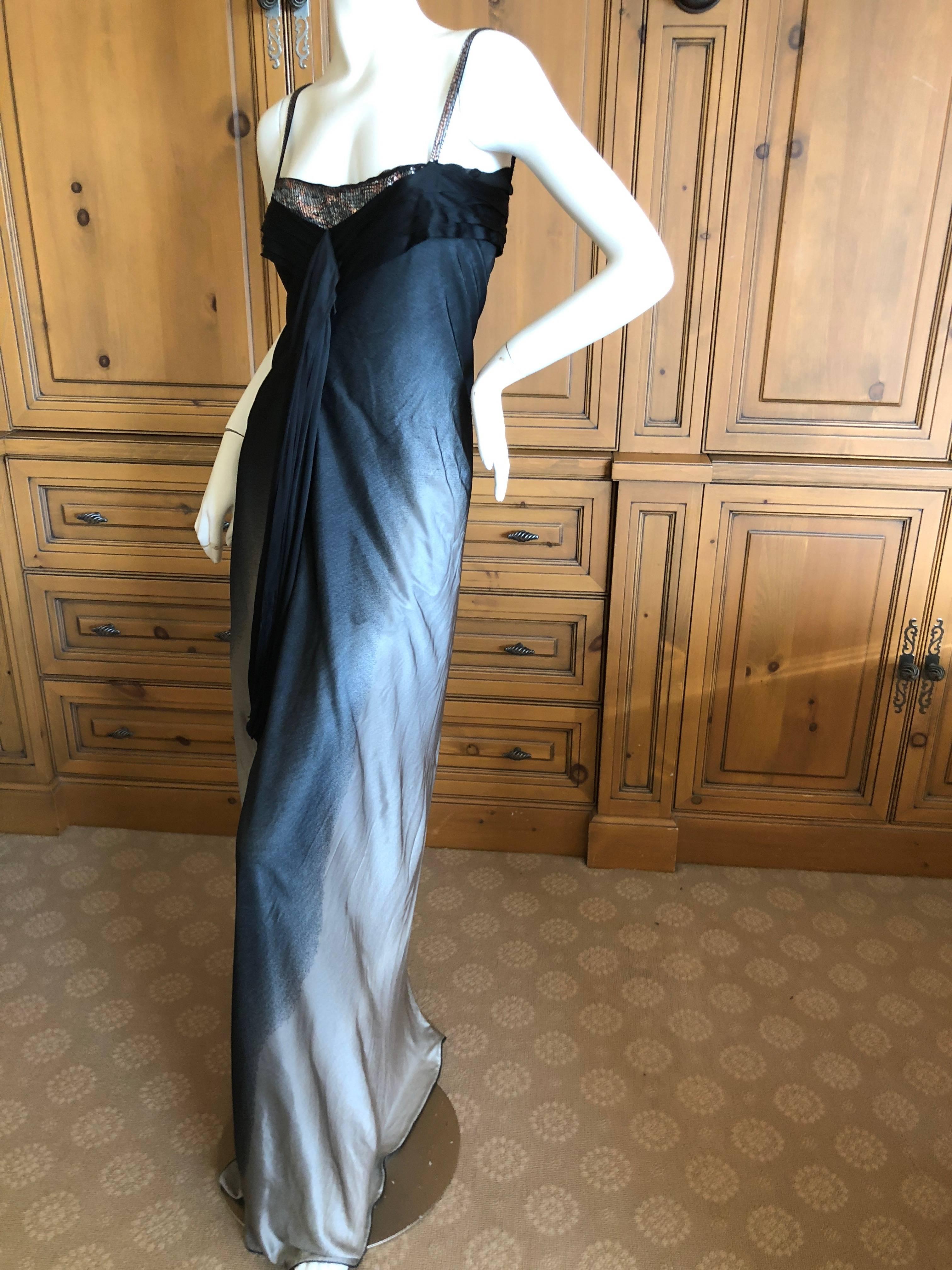 Christian Lacroix Silver and Black Vintage Silk Evening Dress with Sequin Detail.
Ombre silver gray and black, in viscose.
Size M
Bust 34