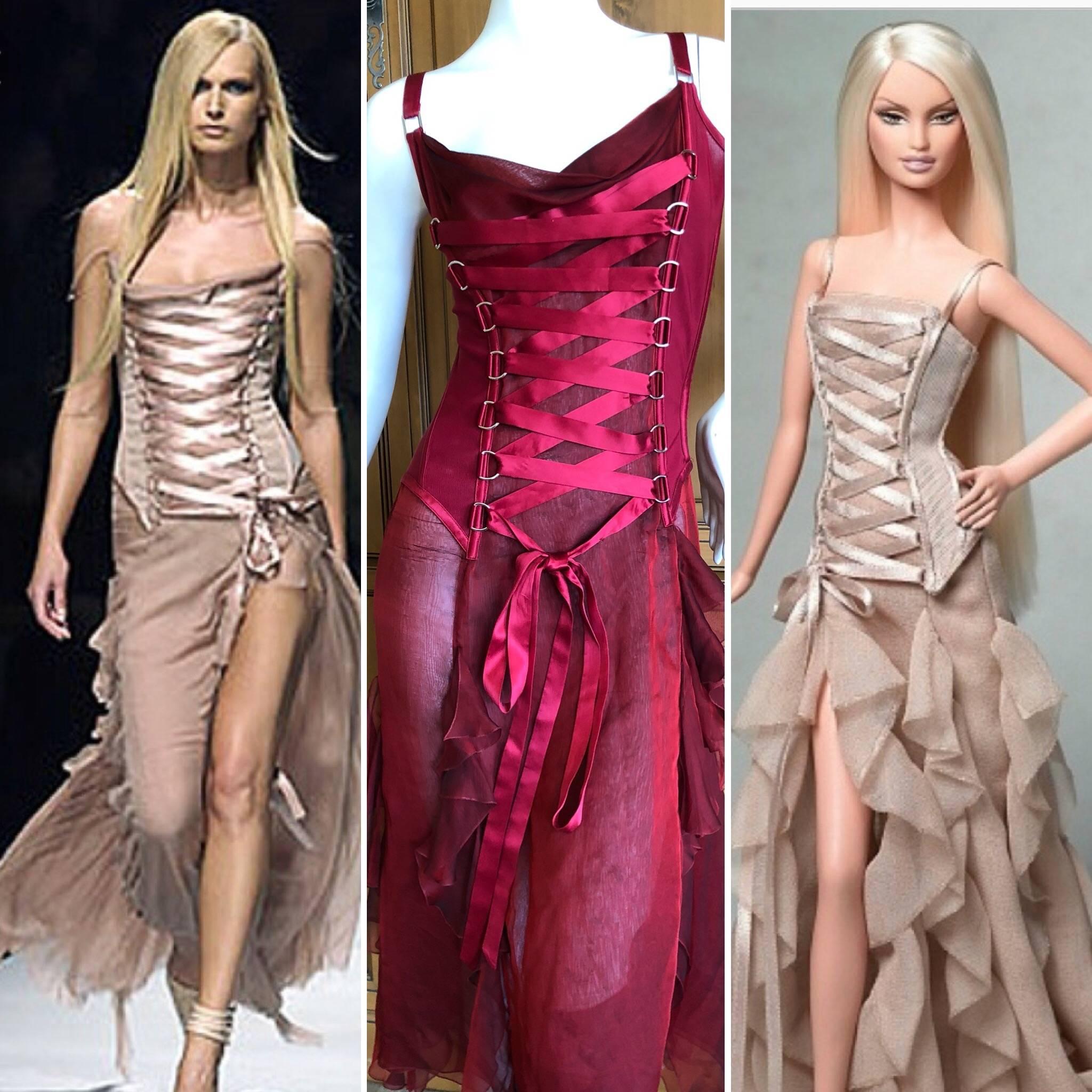 Iconic corset lace dress from Versace, Fall 2003, as featured on Barbie.
This is basically a corset with skirt, so good.
Size 40
Bust 34